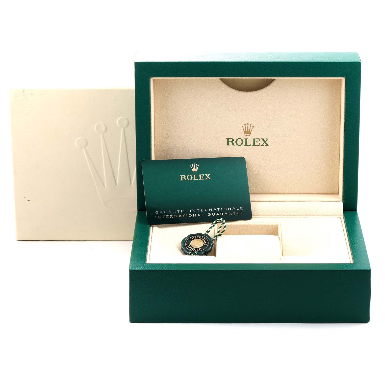 The image shows a green Rolex box for an Oyster Perpetual model watch, with a warranty card and tag inside.