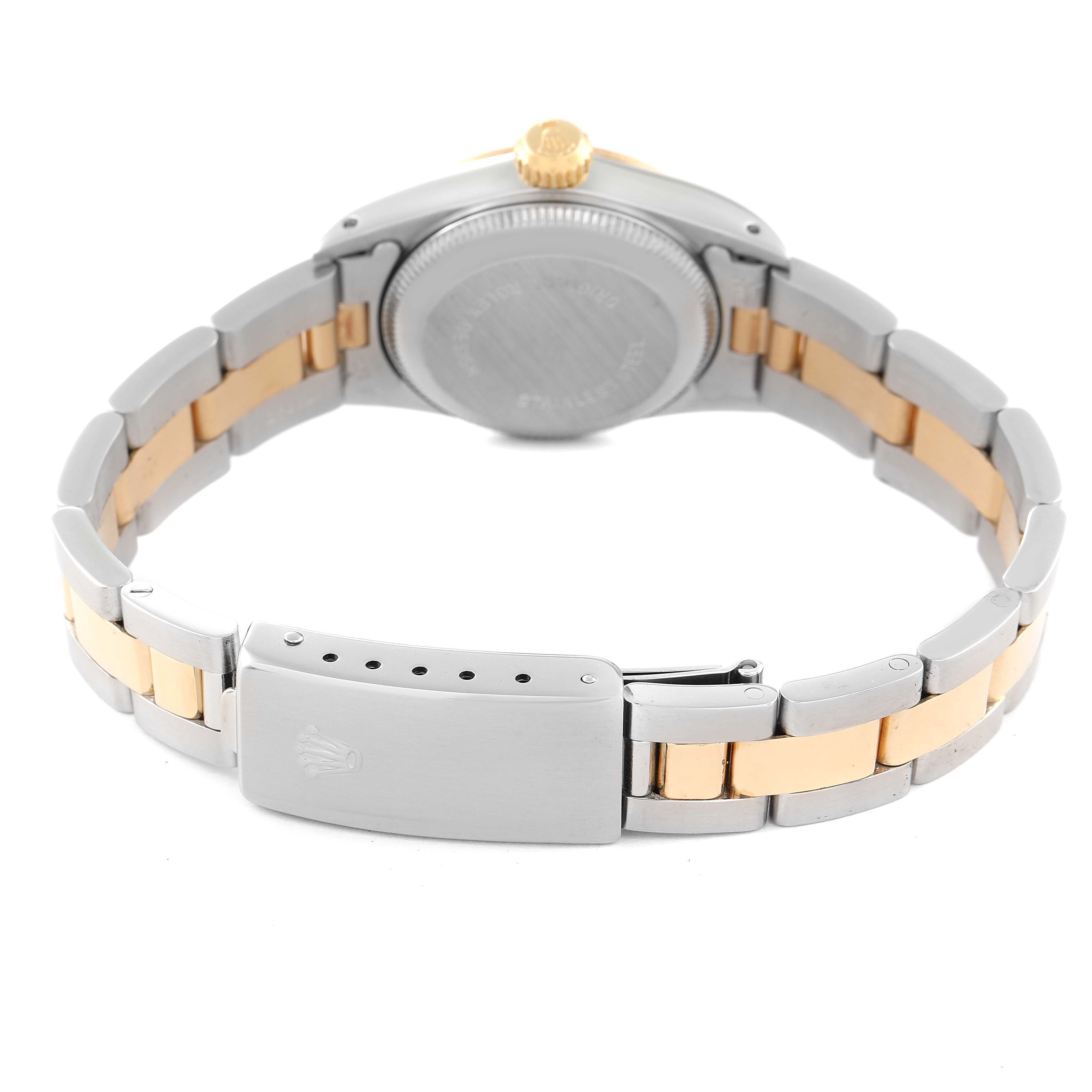 This image shows the back and bracelet of a Rolex Oyster Perpetual 67193 Women's Steel and Gold (two tone) Champagne Dial 67193 Women's Steel and Gold (two tone) Champagne Dial watch, highlighting its two-tone metal design.