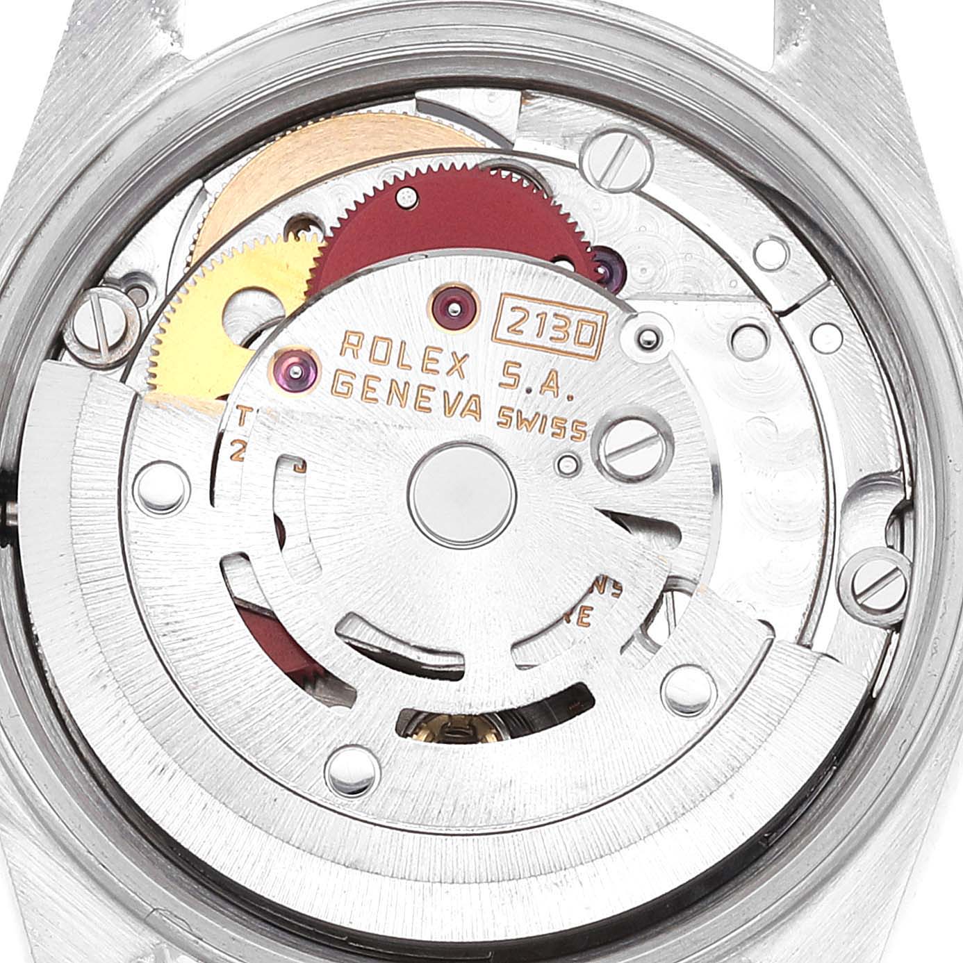 The image shows a close-up view of the inner mechanical movement of a Rolex Oyster Perpetual 67193 Women's Steel and Gold (two tone) Champagne Dial 67193 Women's Steel and Gold (two tone) Champagne Dial watch.