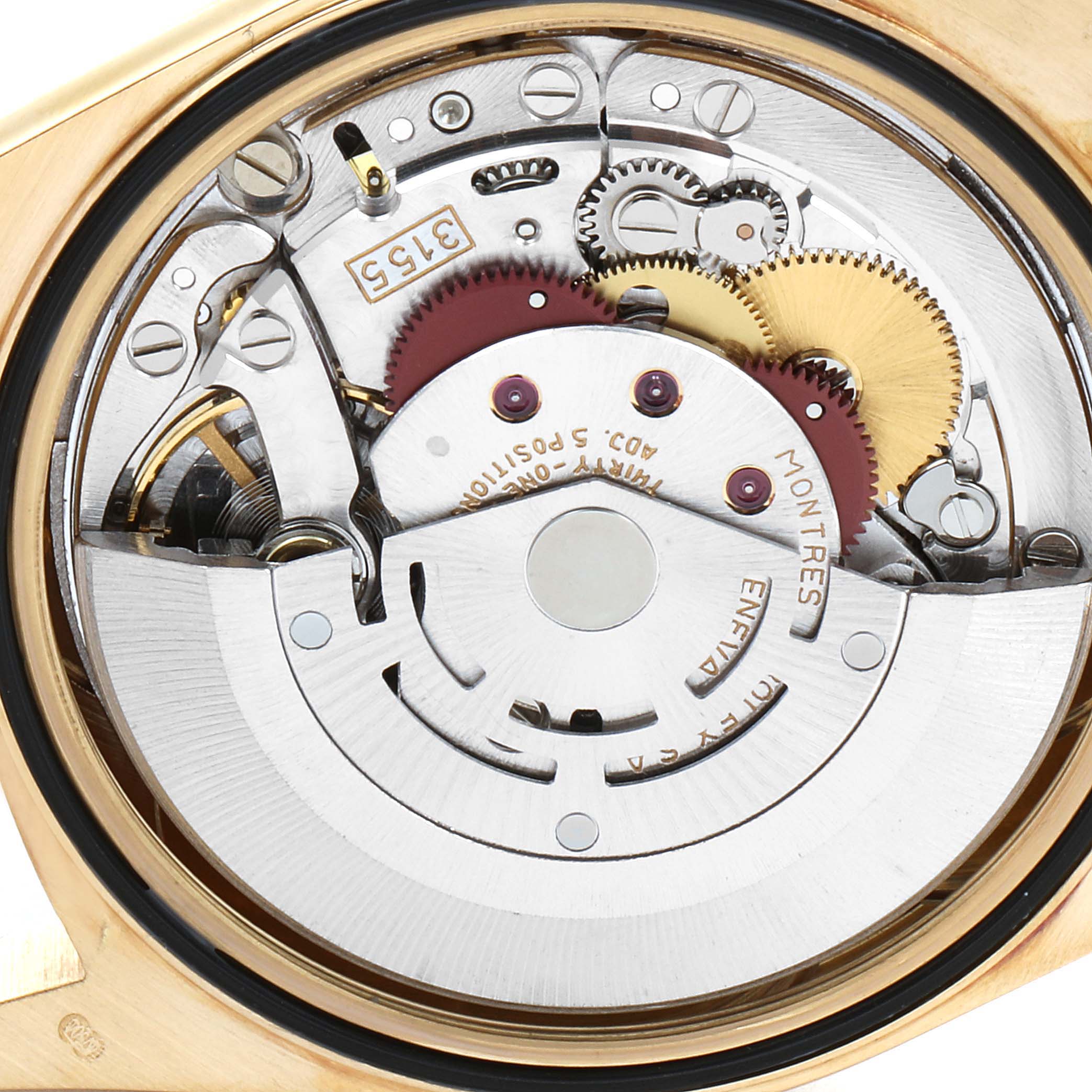 This image shows the intricate internal mechanism of the Rolex President 18238 Men
s Yellow Gold Black Dial 18238 Men
s Yellow Gold Black Dial model watch from a rear angle.