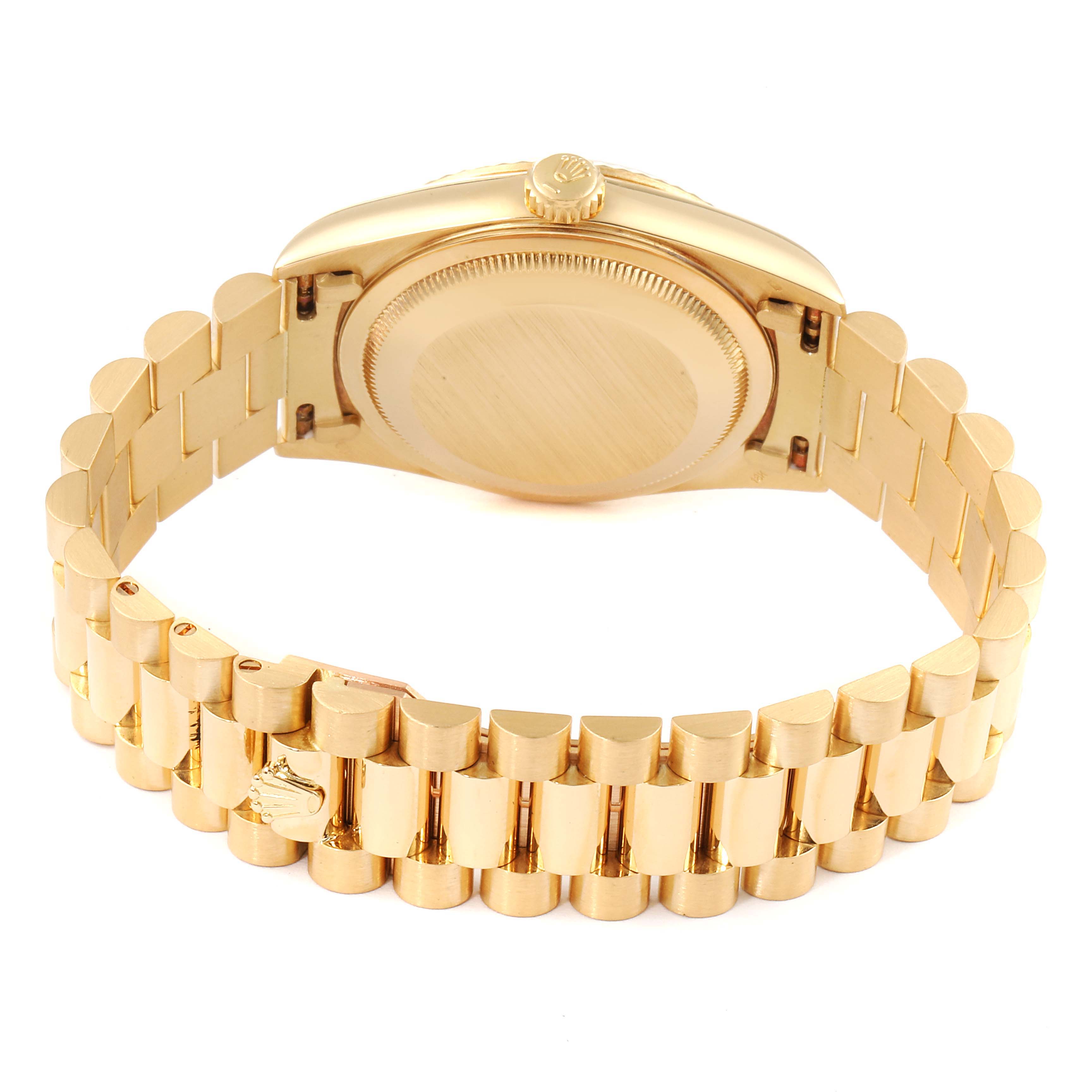 The image shows the back and part of the bracelet of a Rolex President 18238 Men
s Yellow Gold Black Dial 18238 Men
s Yellow Gold Black Dial model watch from a rear perspective.