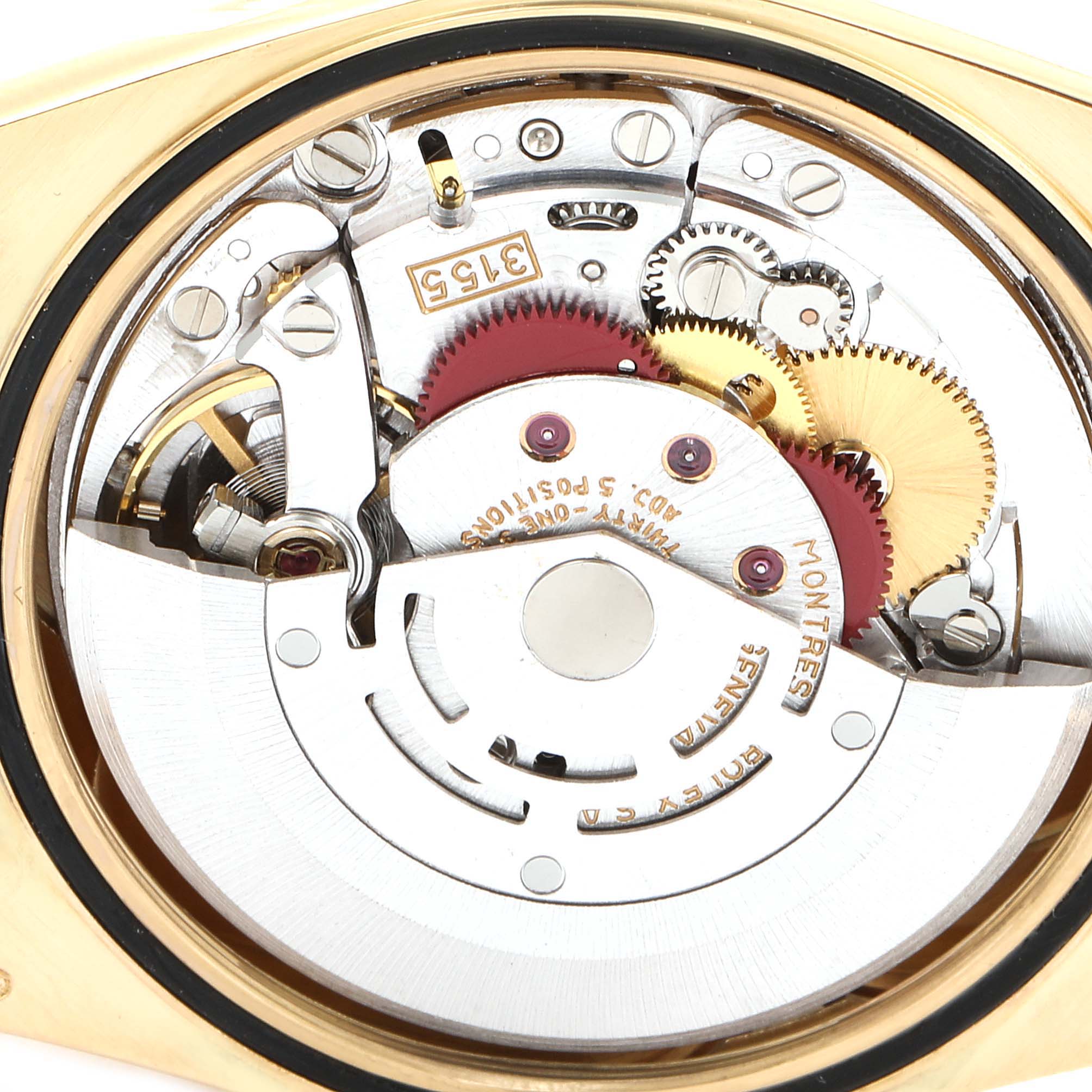 This image shows the internal mechanics of the Rolex President 18238 Men's Yellow Gold Champagne Dial 18238 Men's Yellow Gold Champagne Dial model watch, highlighting gears and movement components.