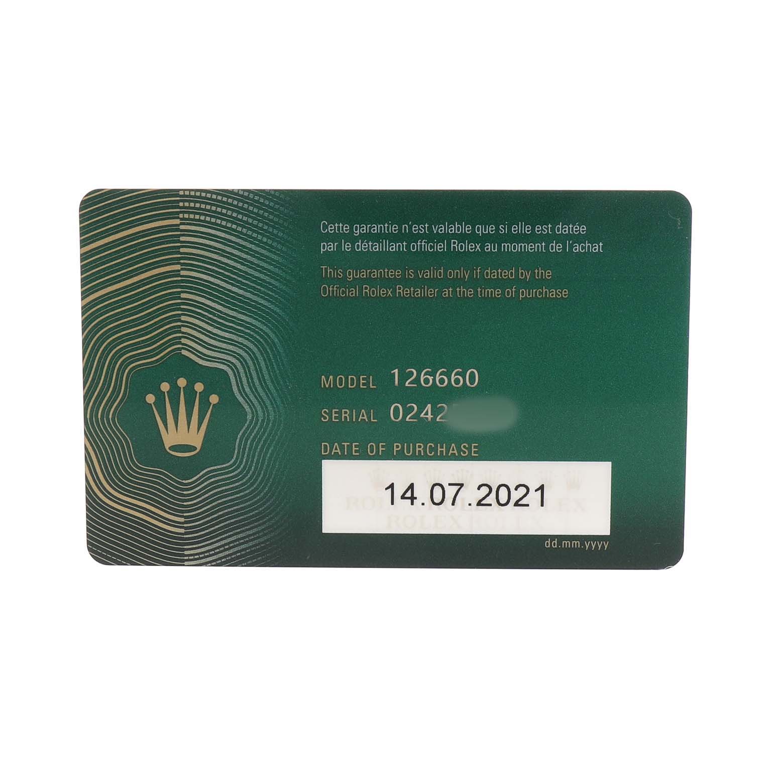 The image shows a straight-on view of a Rolex Sea-Dweller 126660 Men's Stainless Steel Black Dial model warranty card with model and serial number details.