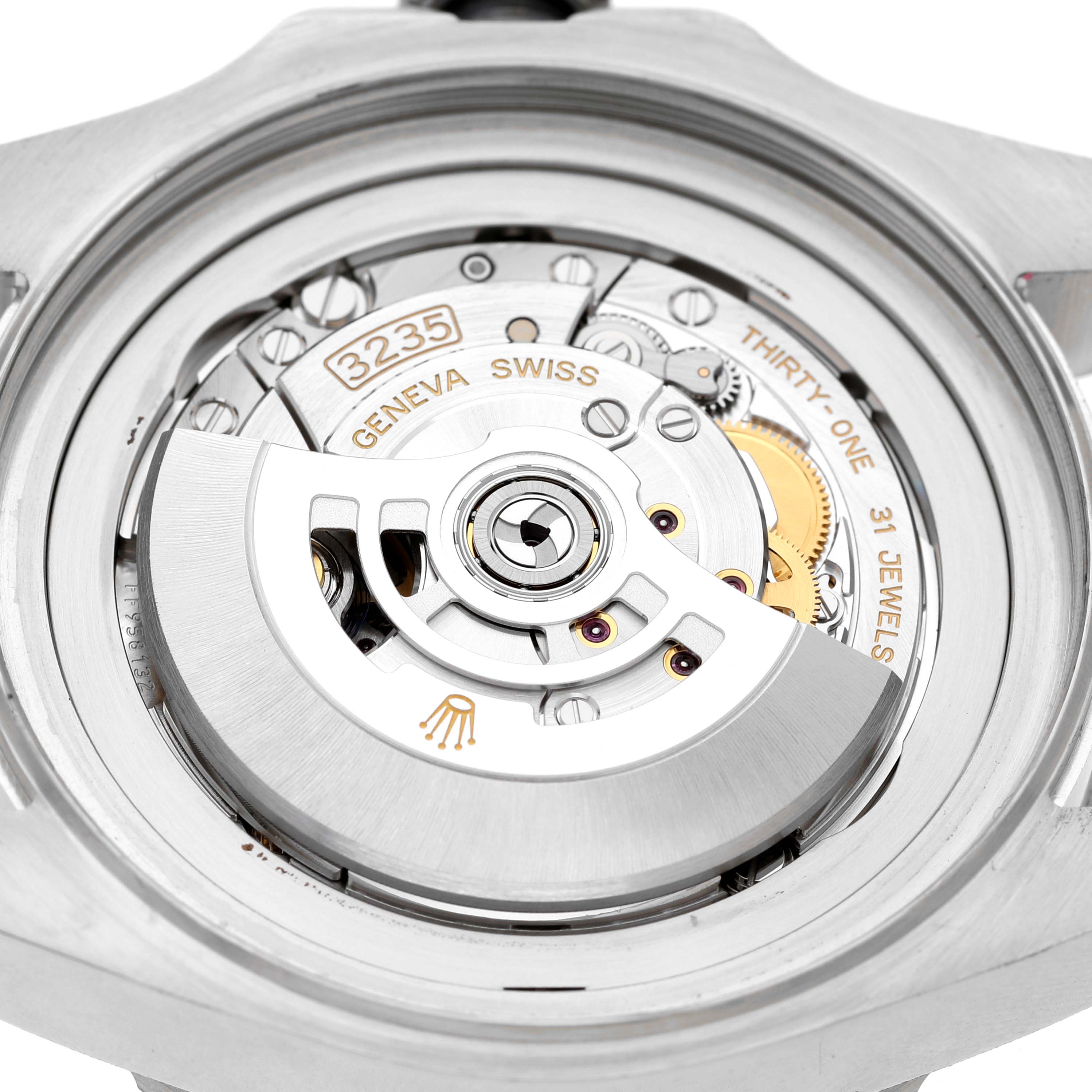 The image shows the back view of a Rolex Sea-Dweller 126660 Men's Stainless Steel Black Dial's open case, highlighting its mechanical movement and rotor details.