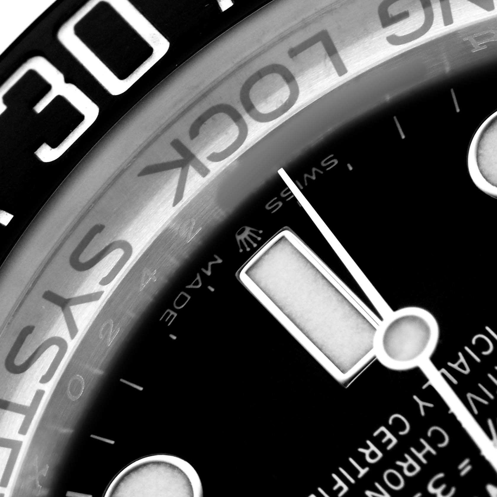 The image shows a close-up of the dial and bezel edge of a Rolex Sea-Dweller 126660 Men's Stainless Steel Black Dial watch, highlighting the markers and "Ring Lock System" text.