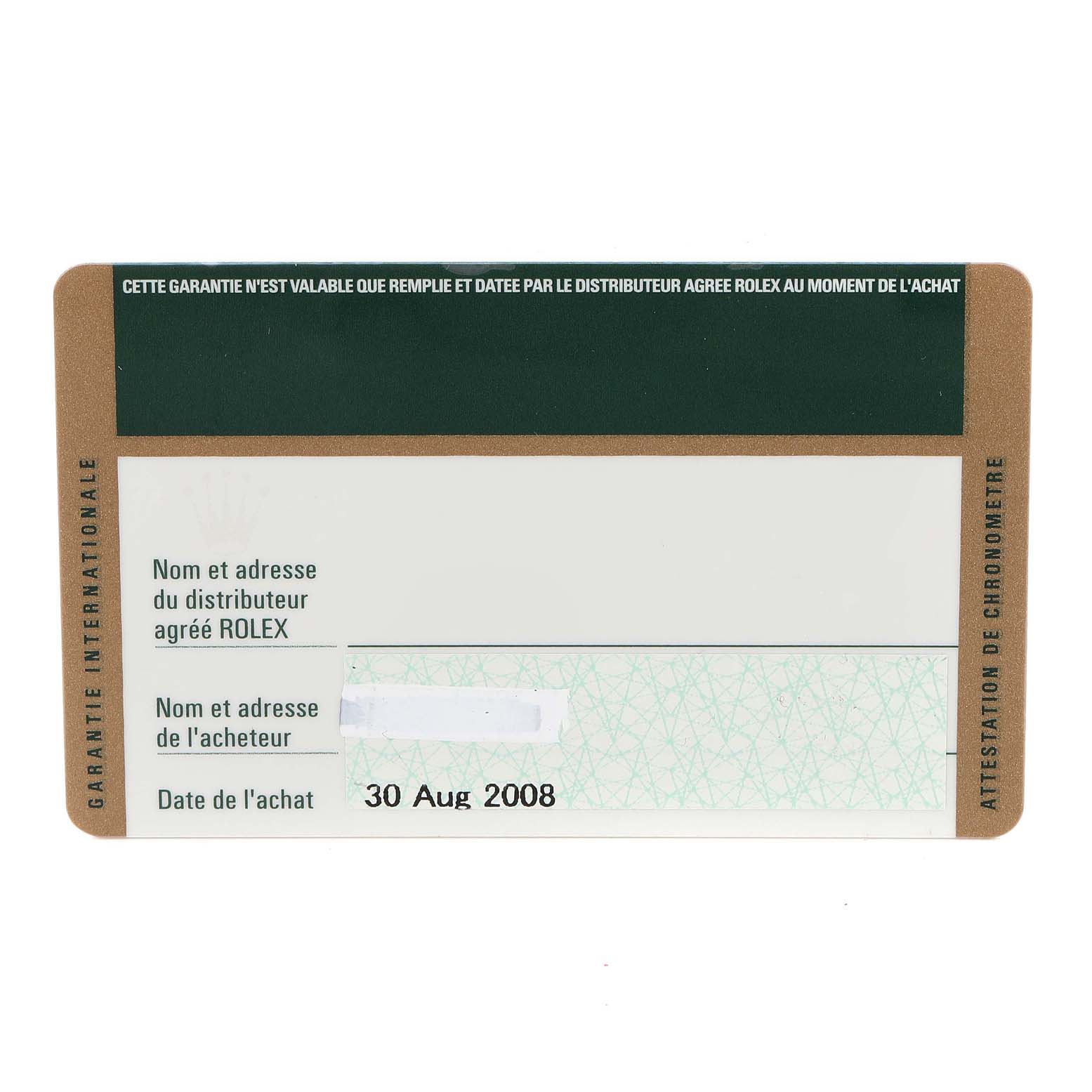 This is a top view of a guarantee card for a Rolex Submariner 16610 Men's Stainless Steel Black Dial 16610 Men's Stainless Steel Black Dial watch, showing purchase date and distributor information.