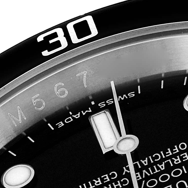 This image shows a partial close-up of the dial and bezel of a Rolex Submariner 16610 Men's Stainless Steel Black Dial 16610 Men's Stainless Steel Black Dial watch, highlighting the number 30 and the minute markers.