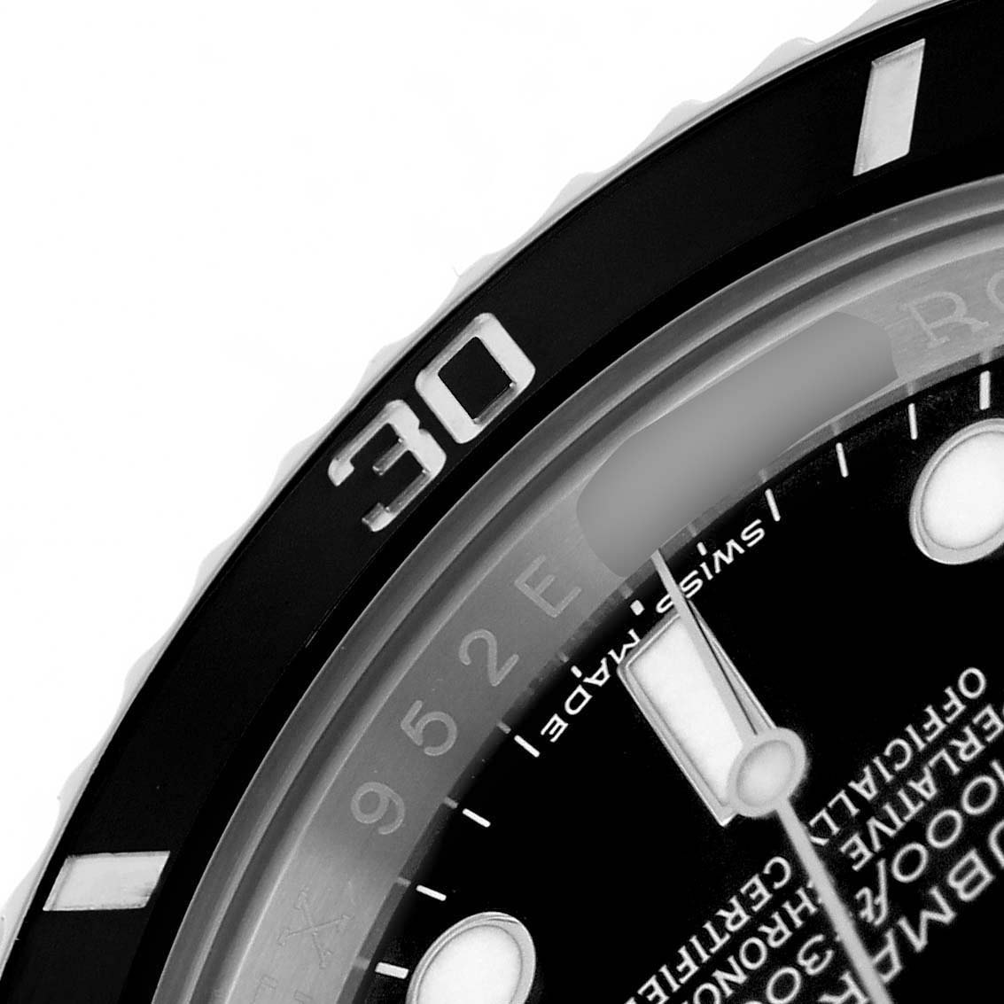 The image shows a close-up of the Rolex Submariner 116610LN Men's Stainless Steel Black Dial watch face, highlighting the bezel and a portion of the dial.