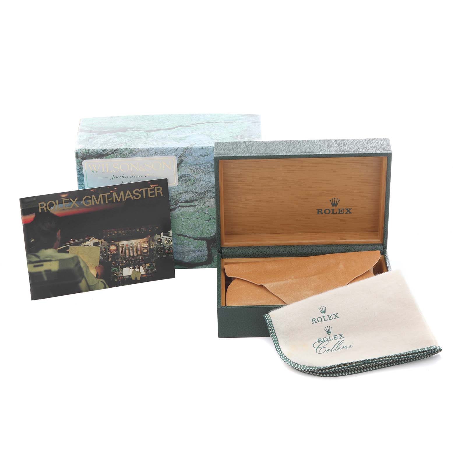 The image shows the packaging and accessories for a Rolex Yacht-Master 169622 Women
s Stainless Steel Silver Dial 169622 Women
s Stainless Steel Silver Dial, including a box, outer sleeve, manual, and cleaning cloth.