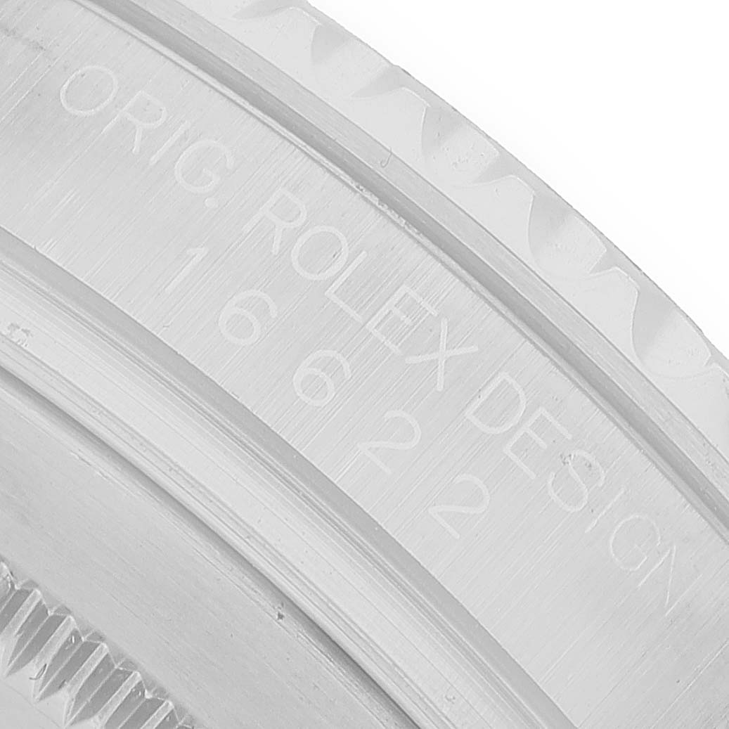 The image shows a close-up of the caseback engraving on a Rolex Yacht-Master 16622 Men's Stainless Steel Silver Dial watch.