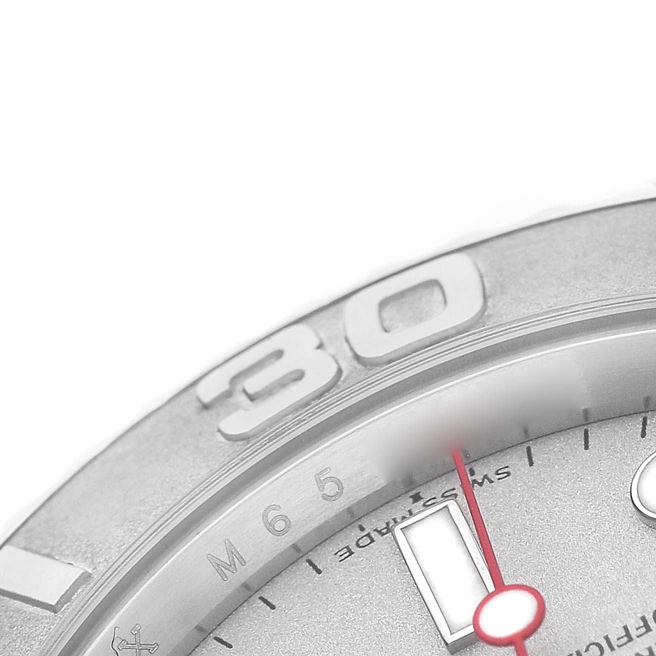 The image shows a close-up of the Rolex Yacht-Master 16622 Men's Stainless Steel Silver Dial watch dial, focusing on the bezel, part of the minute hand, and markers.