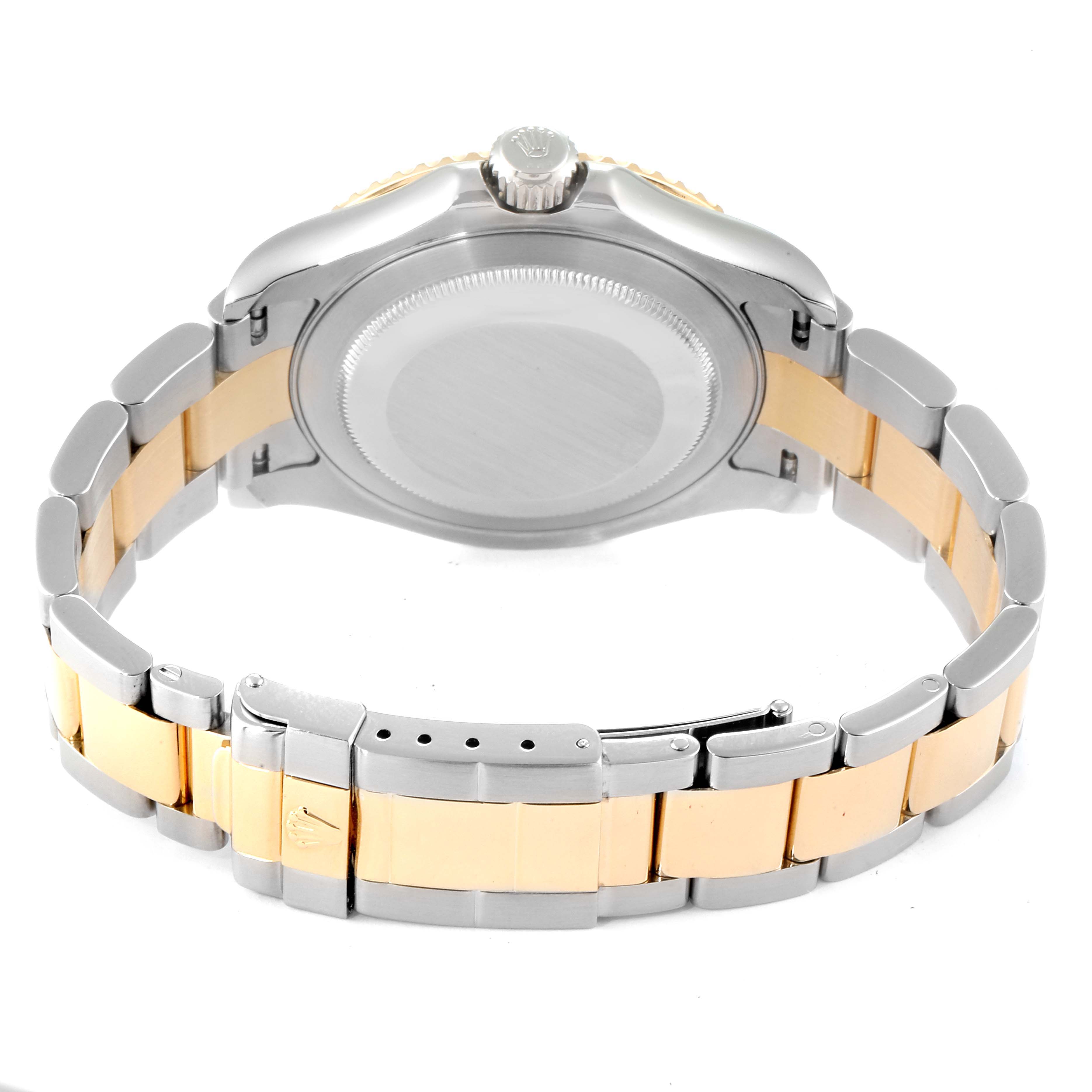 The image shows the back view of the Rolex Yacht-Master 16623 Men's Steel and Gold (two tone) White Dial 16623 Men's Steel and Gold (two tone) White Dial watch, focusing on the case back and two-tone bracelet.