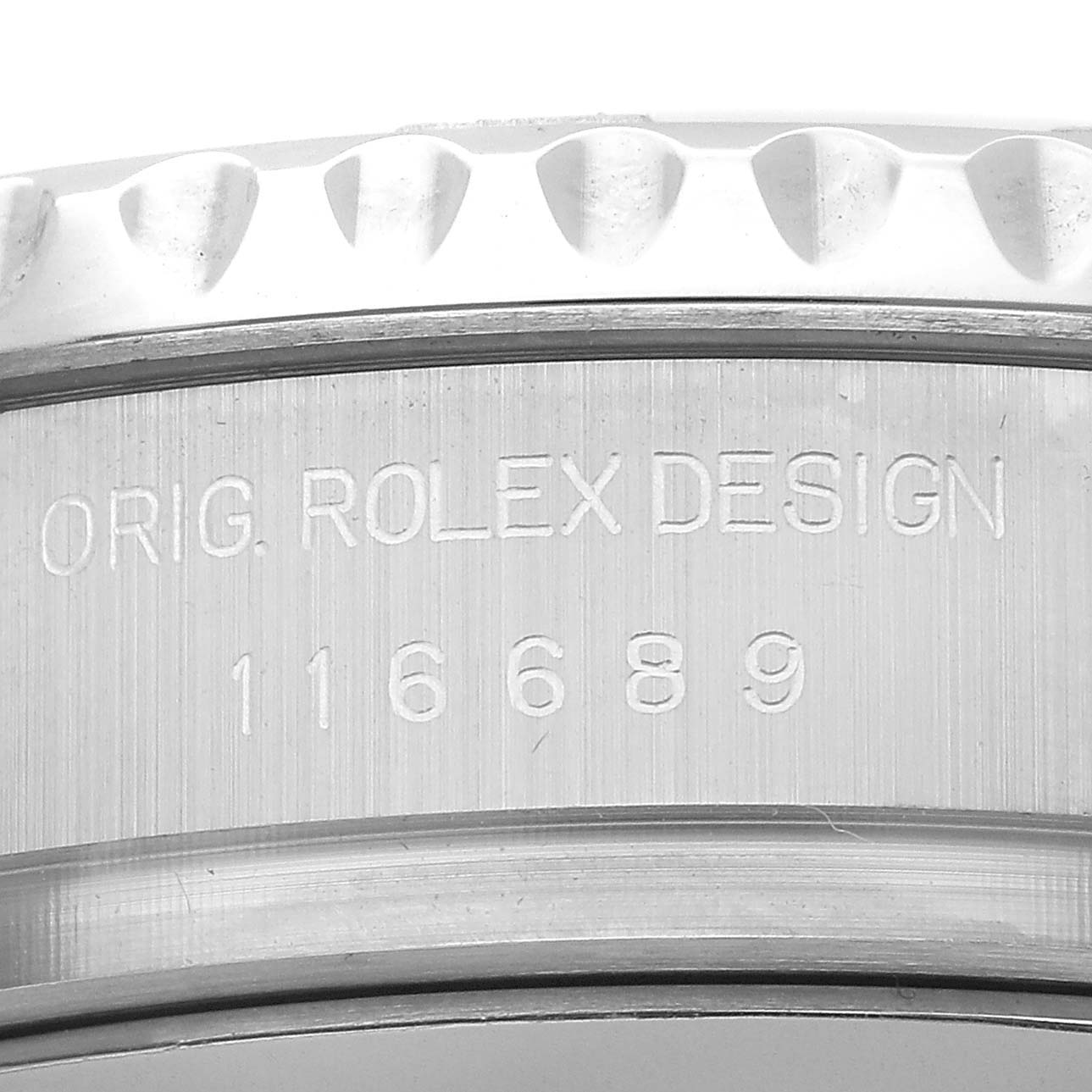 The image shows a close-up of the bezel and outer case of the Rolex Yacht-Master 116689 Men's White Gold White Dial, highlighting the model number engraving.