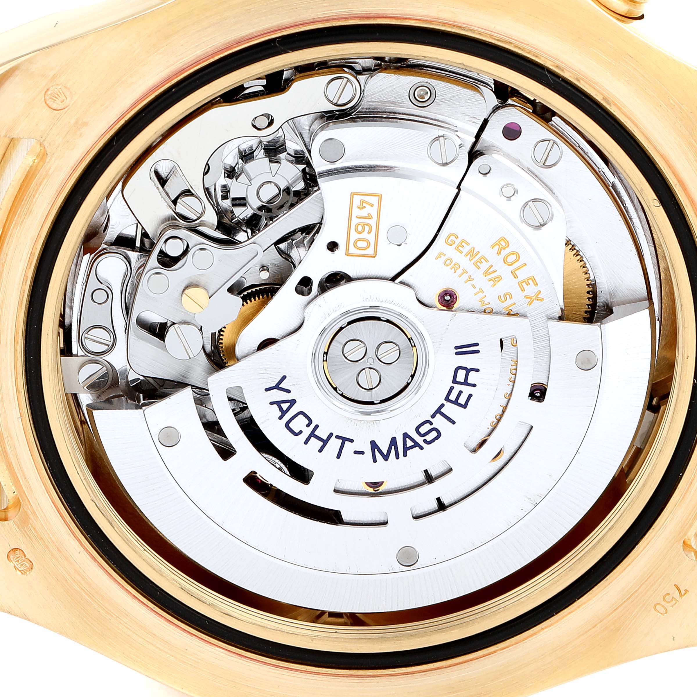 The image shows a close-up view of the Rolex Yacht-Master 116688 Men's Yellow Gold White Dial 116688 Men's Yellow Gold White Dial II's movement, revealing intricate mechanical parts.
