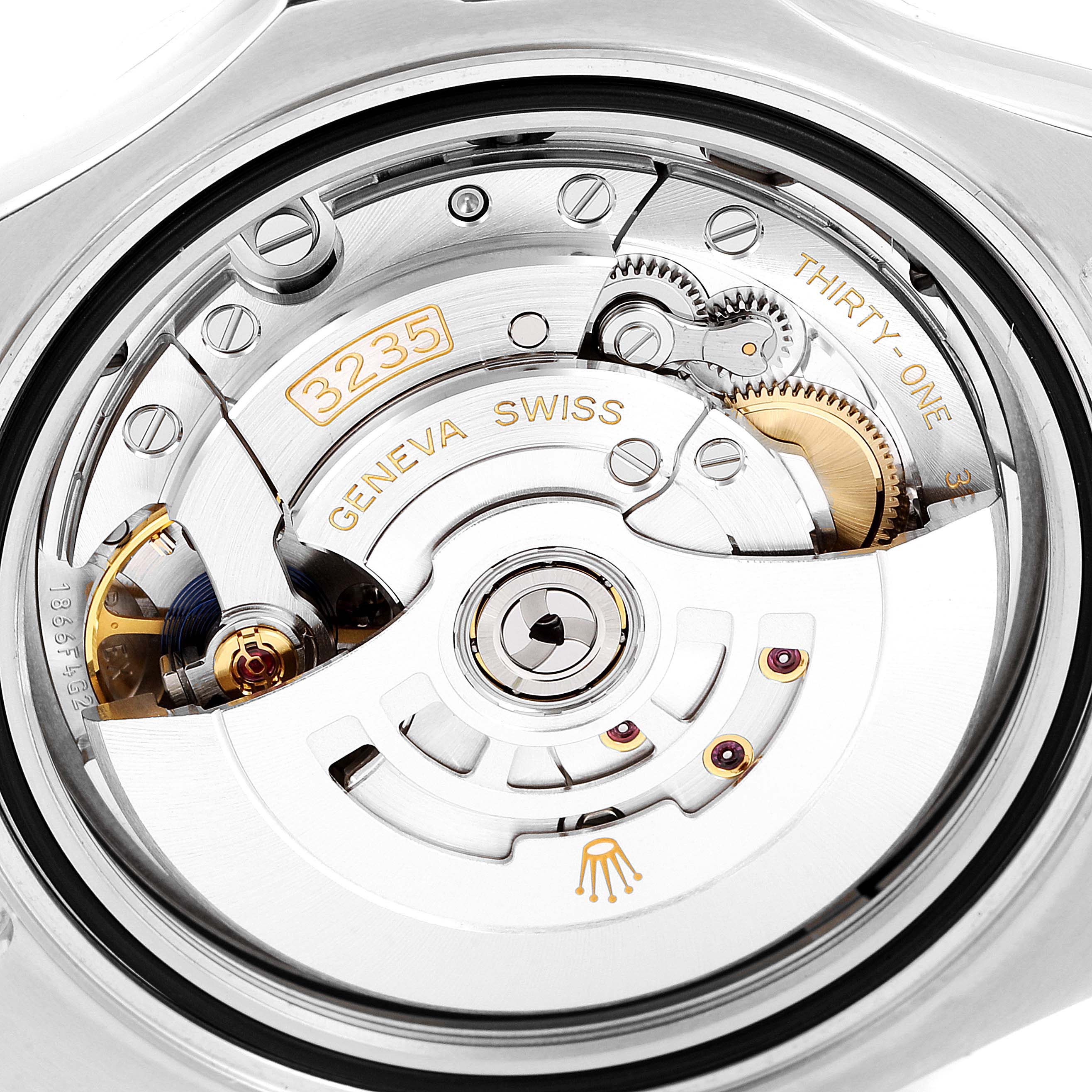 This image shows a close-up view of the movement components of a Rolex Yacht-Master 126622 Men's Stainless Steel Blue Dial 126622 Men's Stainless Steel Blue Dial watch, specifically the caliber 3235.