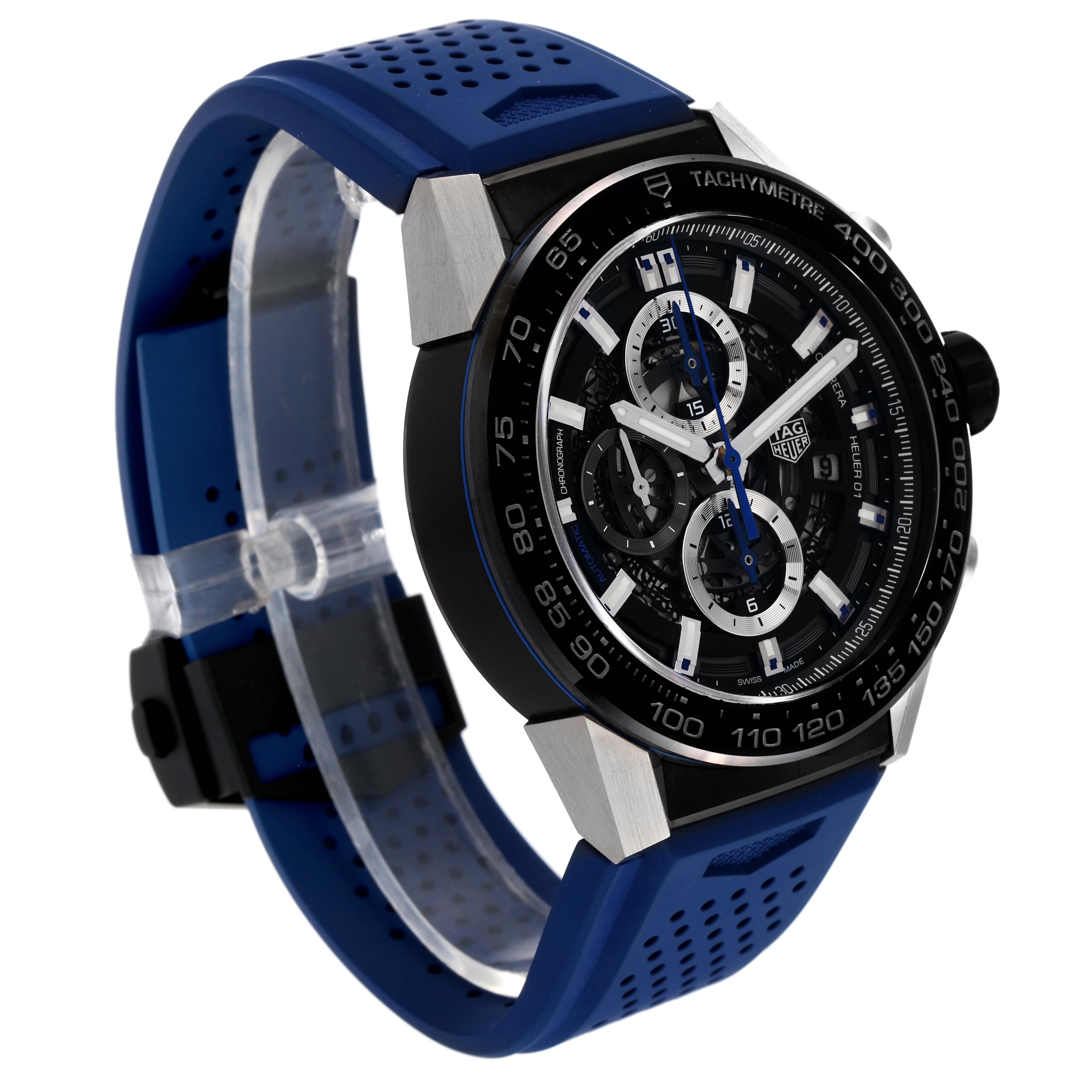 The image shows a Tag Heuer Carrera CAR2A1T Men
s Stainless Steel Black Dial CAR2A1T Men
s Stainless Steel Black Dial watch at a 3/4 angle, highlighting its face, bezel, and blue perforated strap.