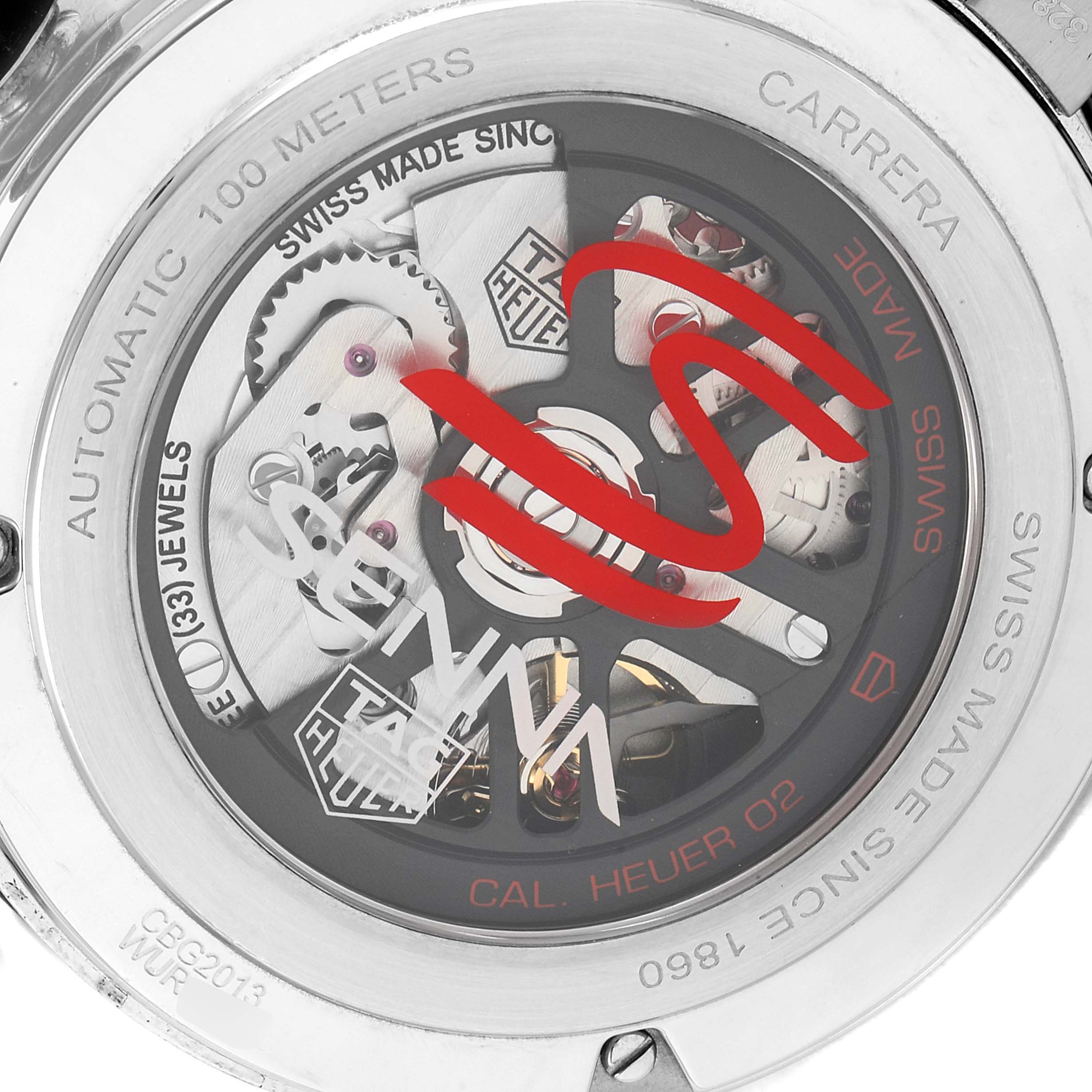 The image shows the back view of a Tag Heuer Carrera CBG2013 Men's Stainless Steel Transparent Dial CBG2013 Men's Stainless Steel Transparent Dial watch, highlighting the movement and inscriptions.
