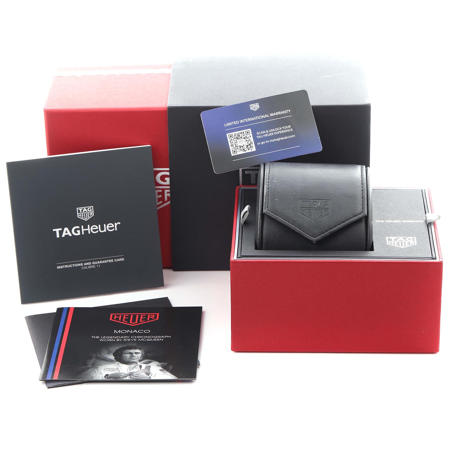 The image shows the Tag Heuer Monaco CAW211P.FC6356 Men's Stainless Steel Blue Dial CAW211P.FC6356 Men's Stainless Steel Blue Dial watch packaging, including boxes, a warranty card, and manuals, from a front angle.