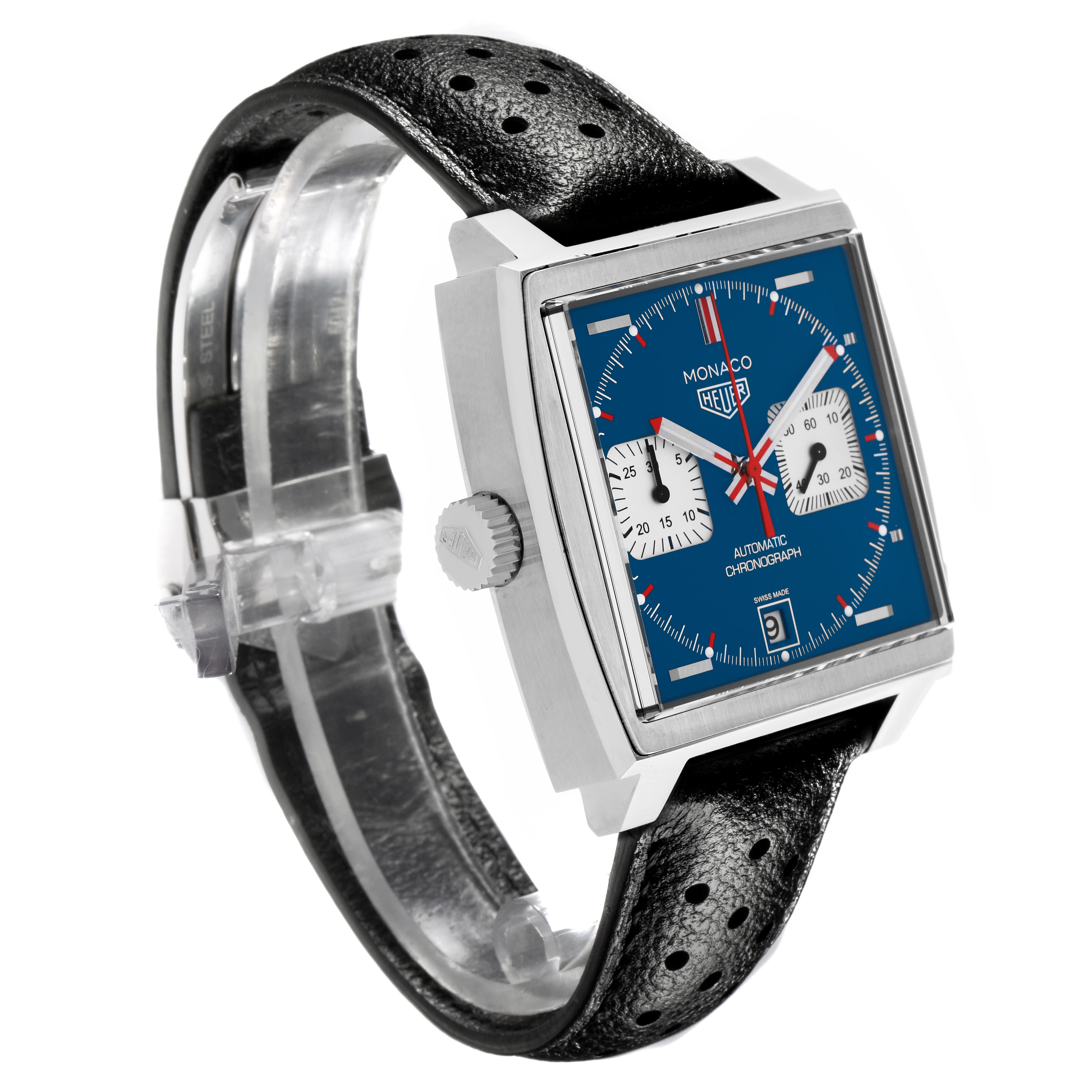 The Tag Heuer Monaco CAW211P.FC6356 Men's Stainless Steel Blue Dial CAW211P.FC6356 Men's Stainless Steel Blue Dial watch is shown at an angled view, highlighting the blue square dial, crown, and black perforated leather strap.