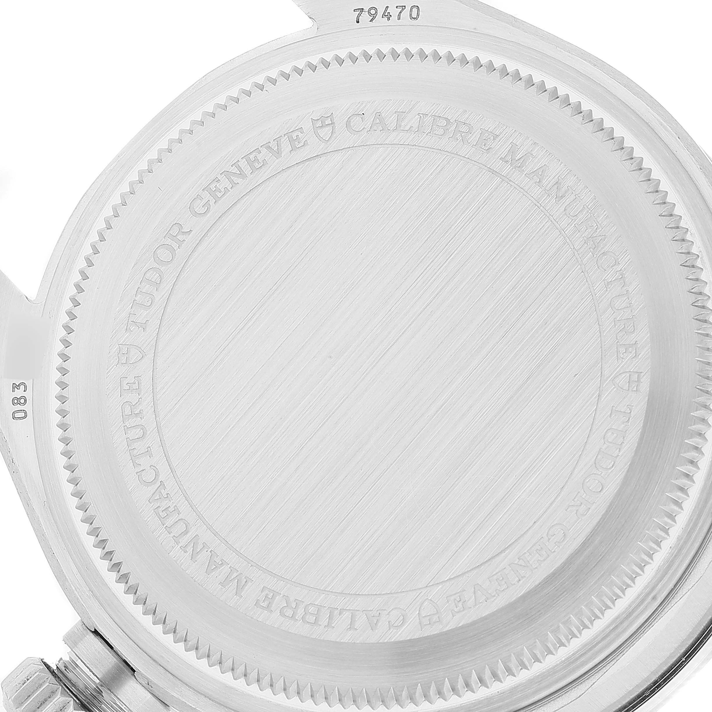 The image shows the case back of a Tudor Heritage Black Bay M79470-0003 Men
s Stainless Steel Black Dial M79470-0003 Men
s Stainless Steel Black Dial watch, highlighting the engraved details.