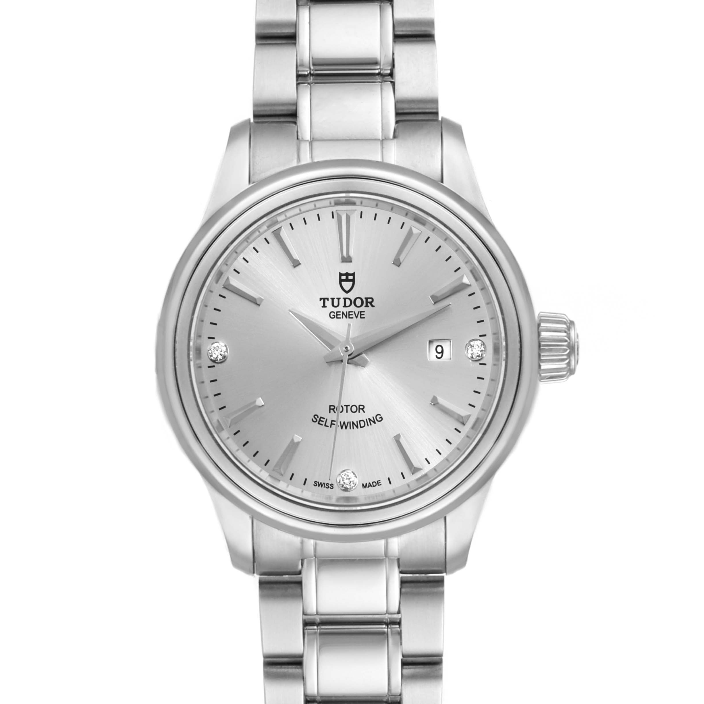 The Tudor Style M12100-0003 Women's Stainless Steel Silver Dial M12100-0003 Women's Stainless Steel Silver Dial model watch is shown from a front angle, displaying its face, crown, and stainless steel bracelet.