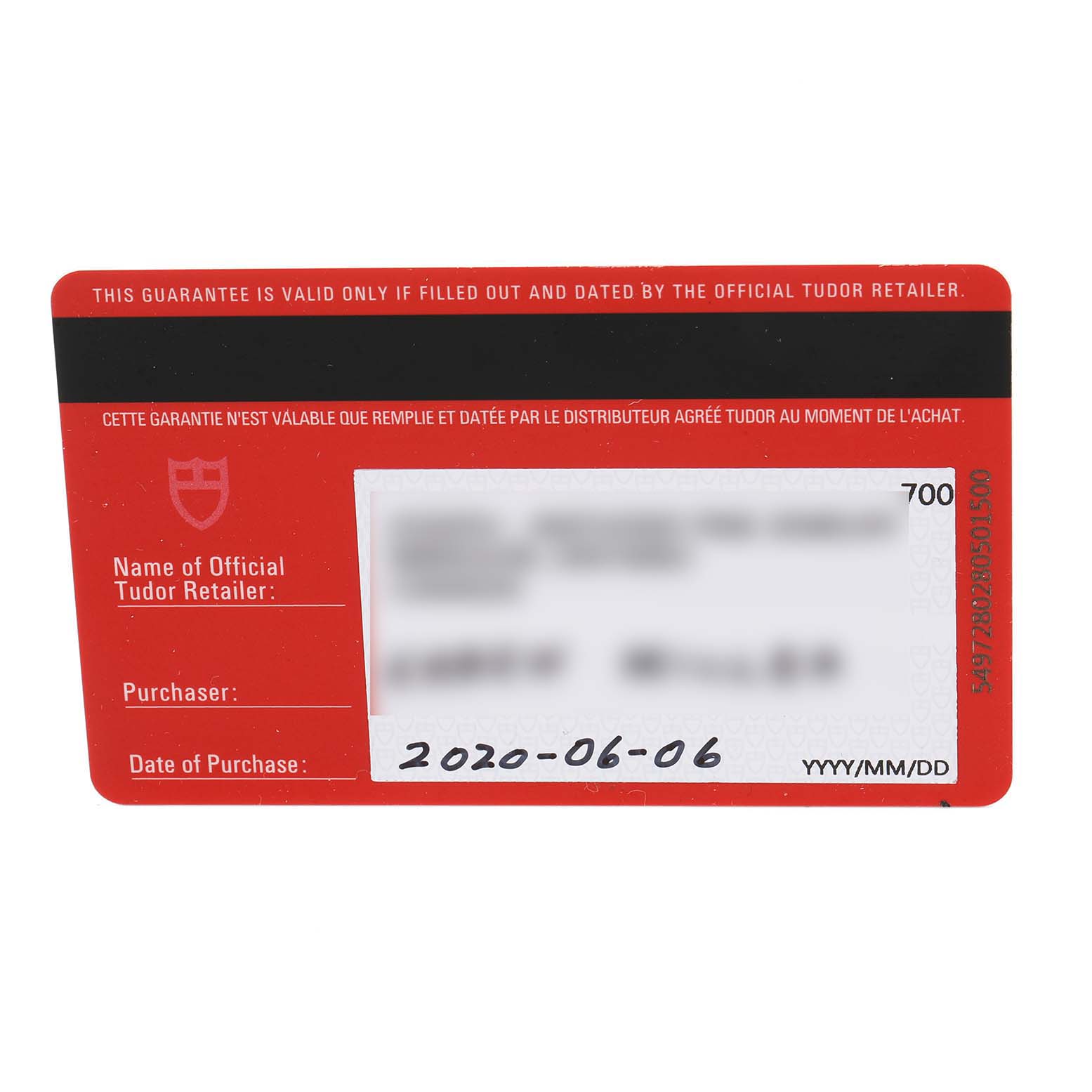 This image shows a close-up of the warranty card for a Tudor Style M12100-0003 Women's Stainless Steel Silver Dial M12100-0003 Women's Stainless Steel Silver Dial model watch, including the purchase date.