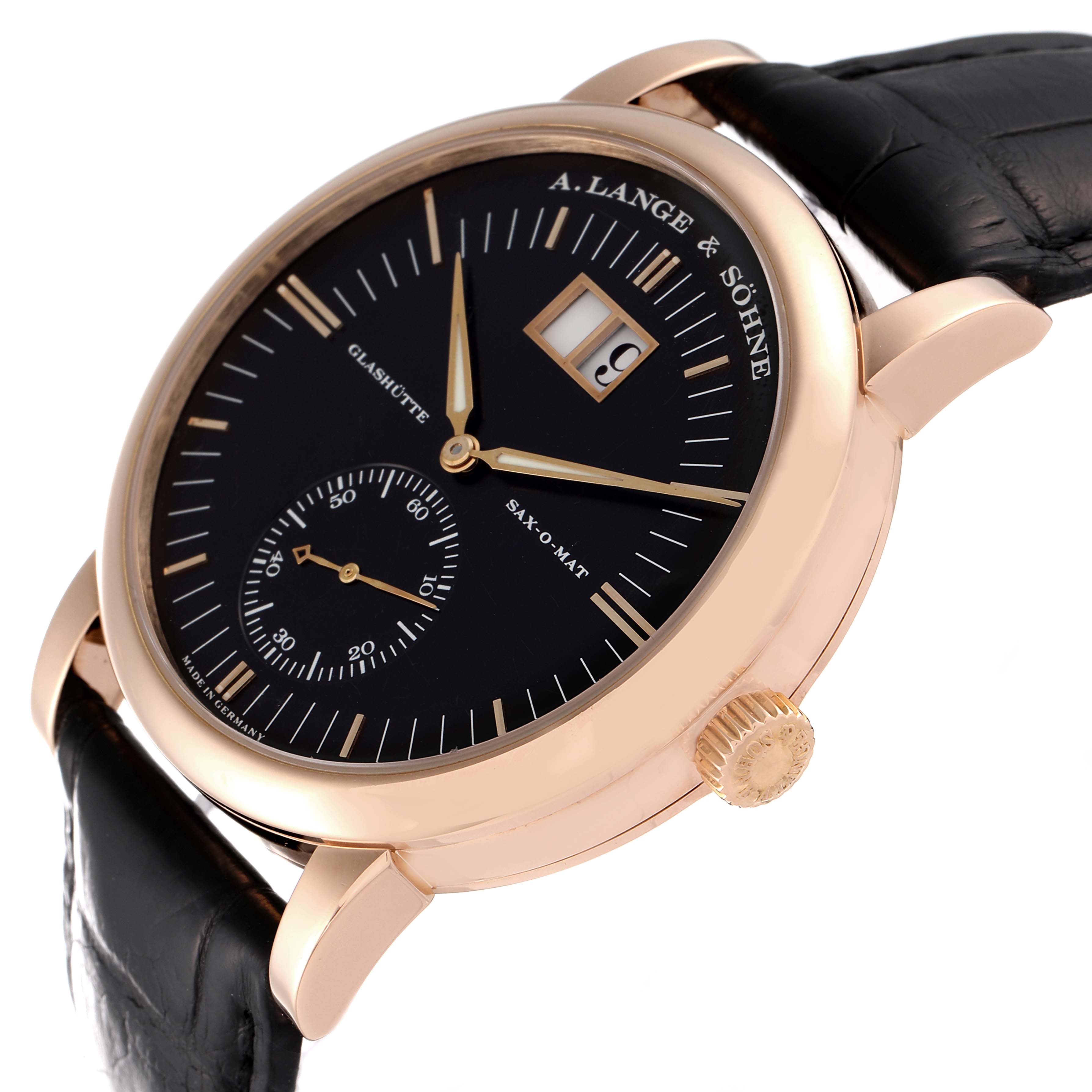 The Richard Lange model by A. Lange & Söhne is shown at a slight angle, highlighting its black dial, gold case, and sub-dial.