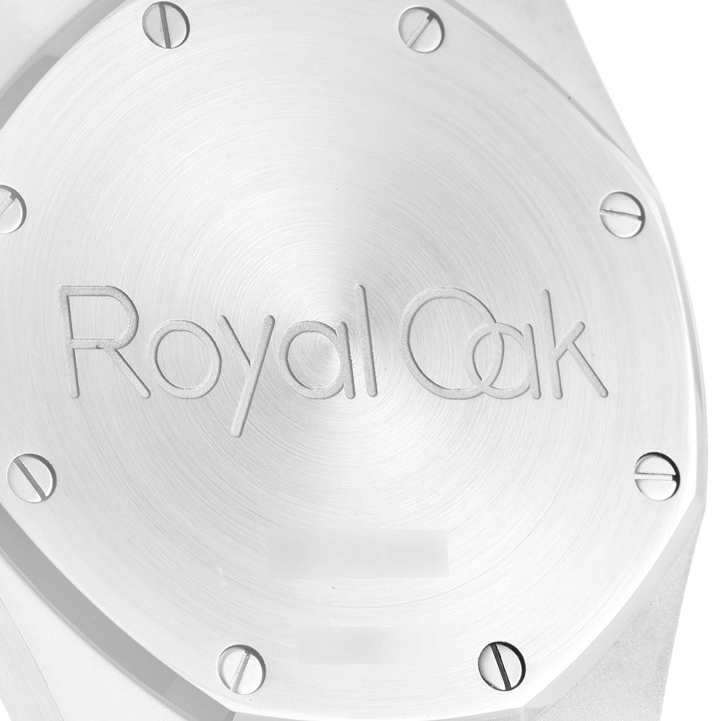 The image shows a close-up of the back case of a Royal Oak watch by Audemars Piguet.