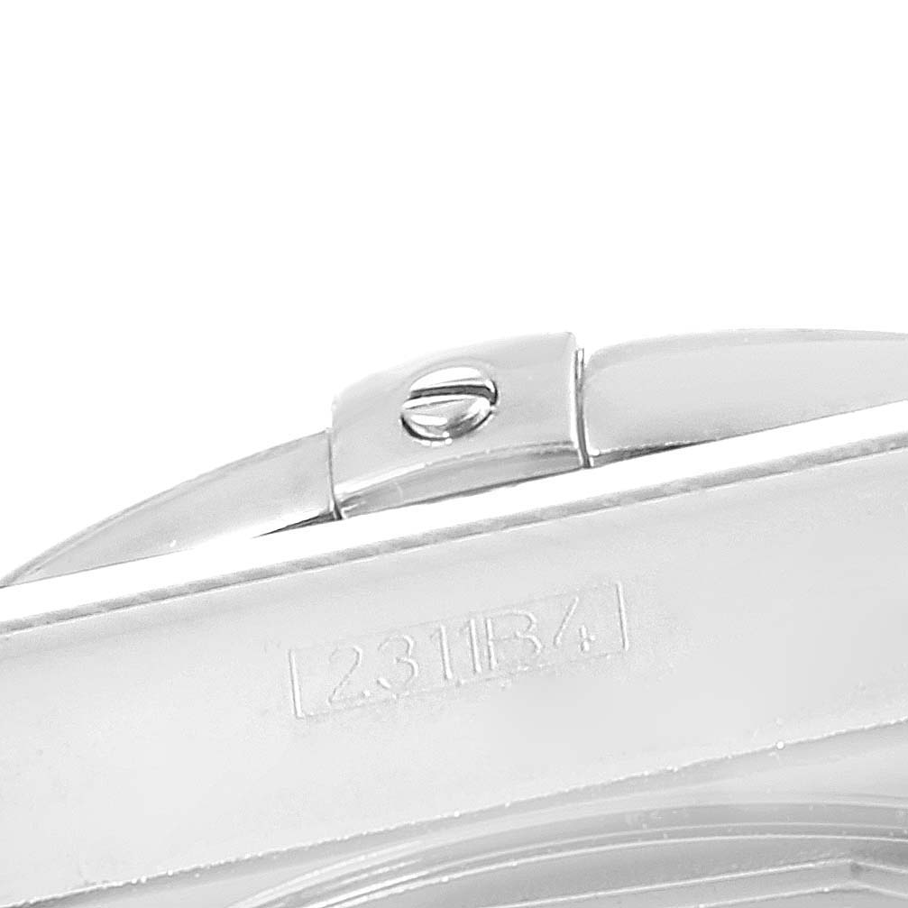 The image shows a close-up of the clasp of the Breitling Chronomat AB0110 Men's Stainless Steel Black Dial AB0110 Men's Stainless Steel Black Dial watch model from a top-down angle.