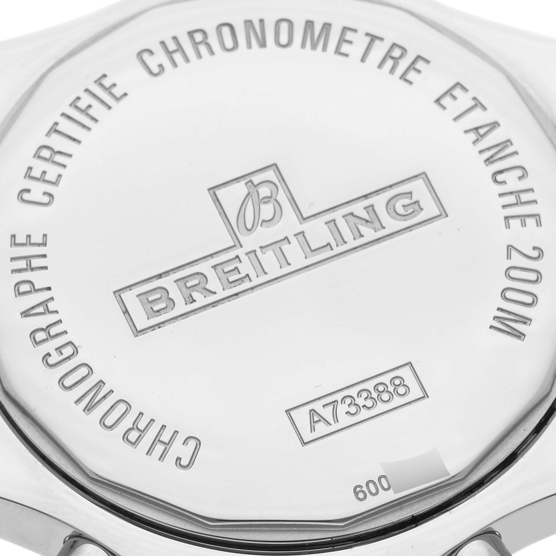 The image shows the case back of a Breitling Colt A73388 Men's Stainless Steel Blue Dial A73388 Men's Stainless Steel Blue Dial watch, featuring engraved details and branding.