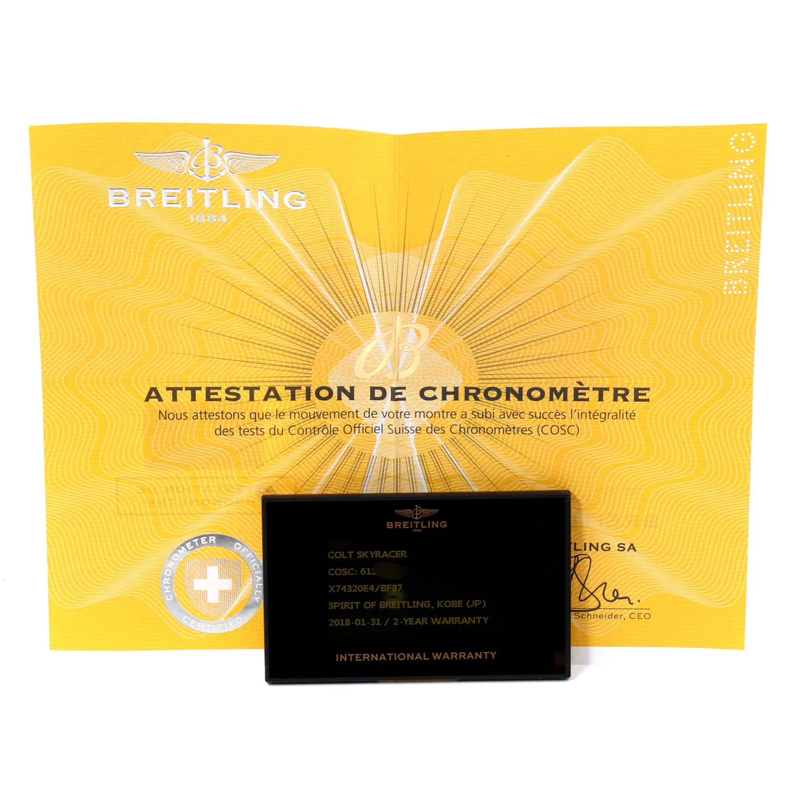 The image shows the certification papers and warranty card for a Breitling Colt X74320 Men's Titanium Black Dial X74320 Men's Titanium Black Dial model watch.