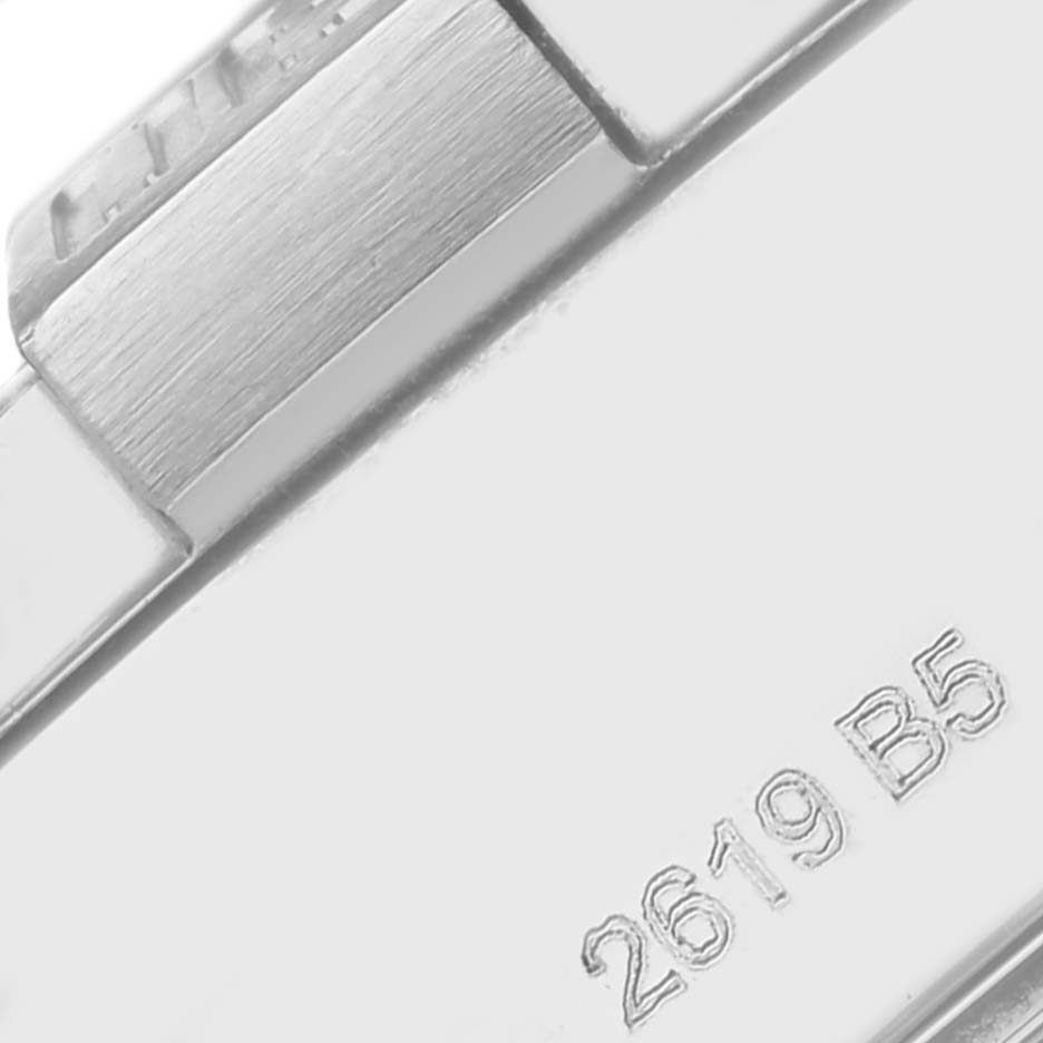 The image shows a close-up of the bracelet clasp on a Breitling Avenger A13371111B1A1 Men's Stainless Steel Black Dial A13371111B1A1 Men's Stainless Steel Black Dial watch, featuring an engraved number.