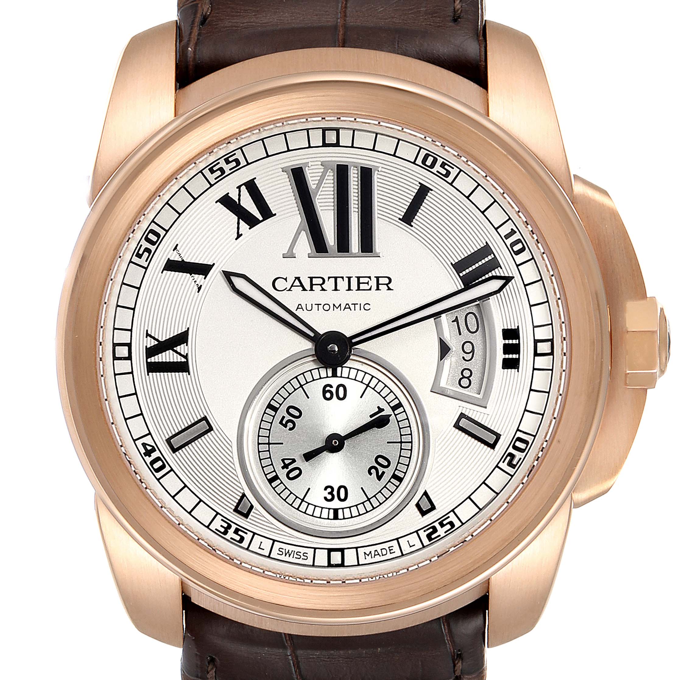 The image shows a close-up front view of Calibre de Cartier by Cartier, highlighting the dial, bezel, and strap attachment.