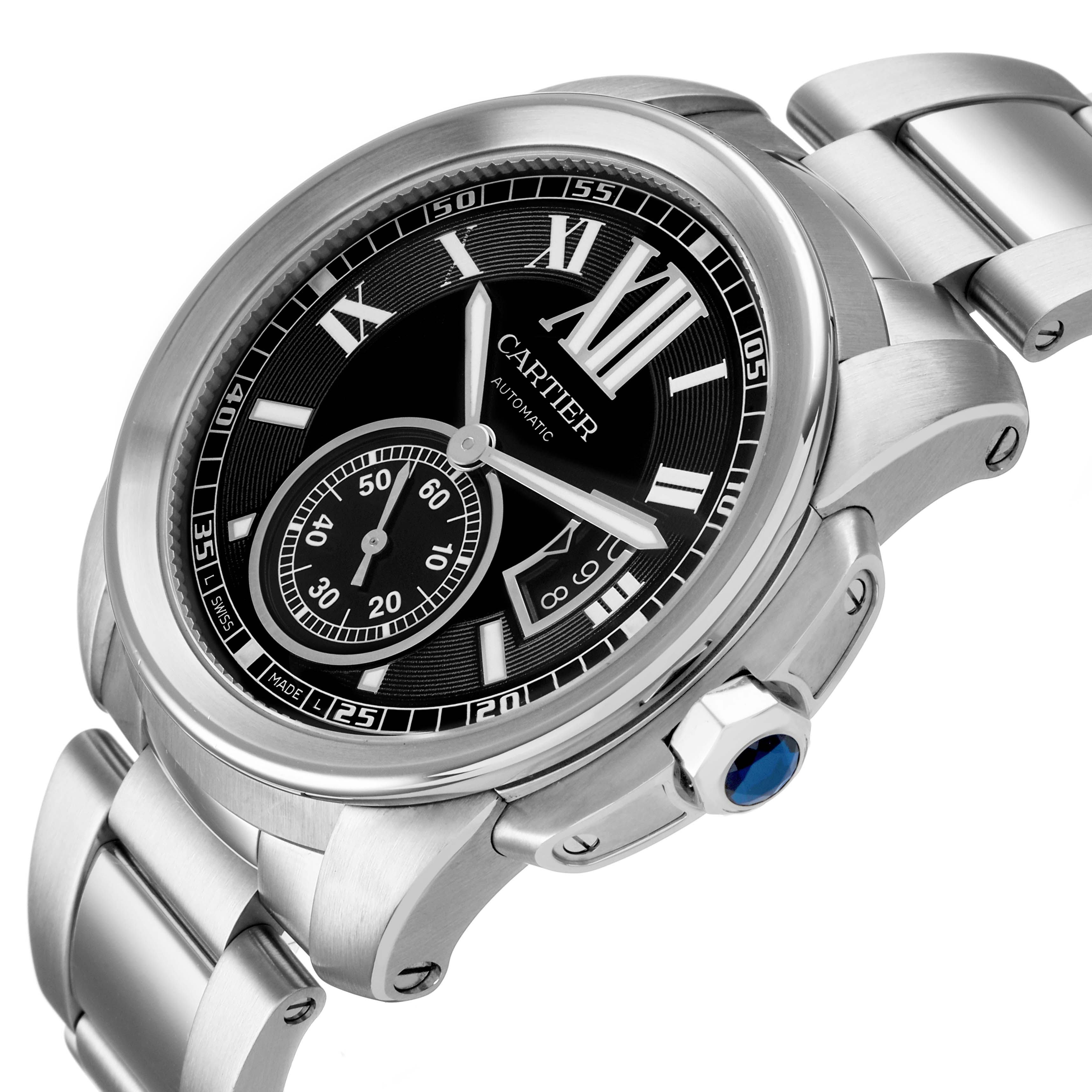 The Calibre de Cartier watch is shown at an angled view, highlighting its face, bezel, crown, and metal bracelet.