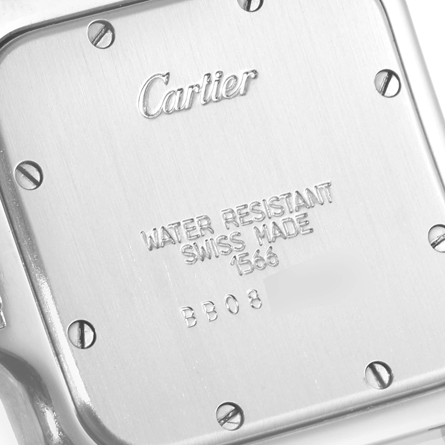 This image shows the back case of the Cartier Santos 1566 Men
s Steel and Gold (two tone) Silver Dial 1566 Men
s Steel and Gold (two tone) Silver Dial watch, featuring branding and water-resistant information.