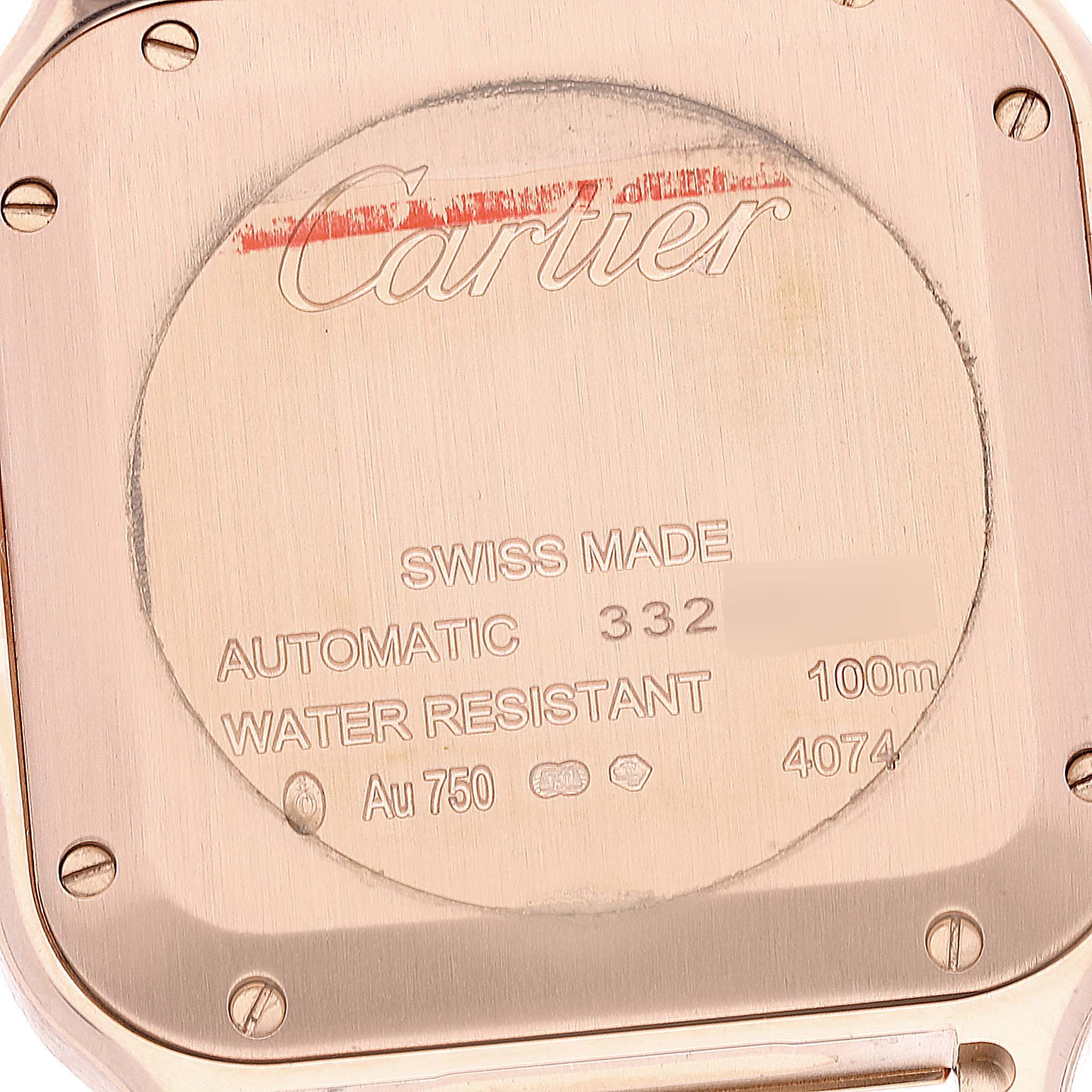 This is the back case of a Cartier Santos WJSA0007 Men
s Rose Gold Silver Dial WJSA0007 Men
s Rose Gold Silver Dial watch, displaying the brand name, model details, and water resistance.