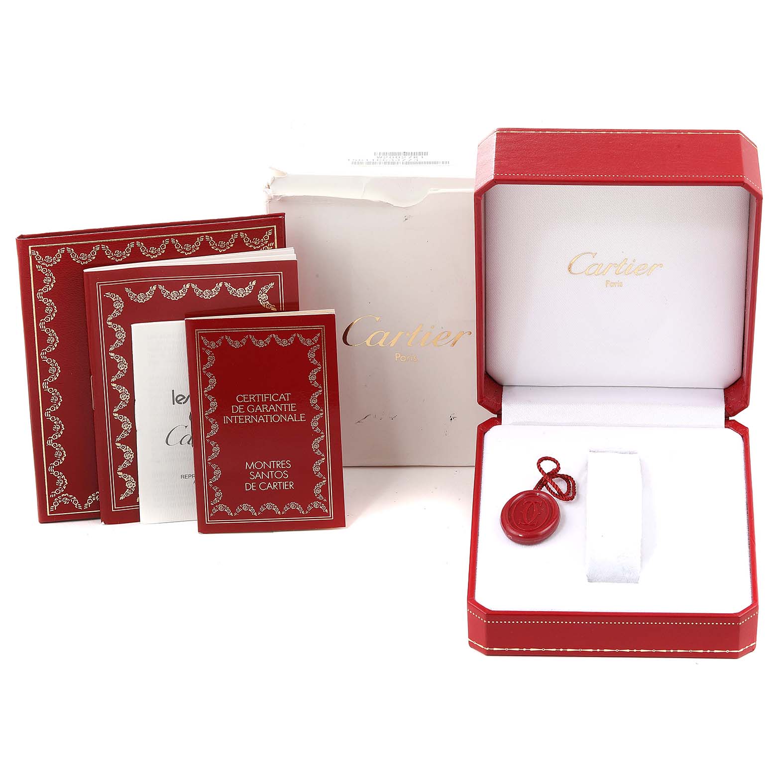 The image shows the packaging and certification for the Cartier Ronde W20028G1 Men
s Steel and Gold (two tone) Silver Dial W20028G1 Men
s Steel and Gold (two tone) Silver Dial model watch, including a red box and several booklets.