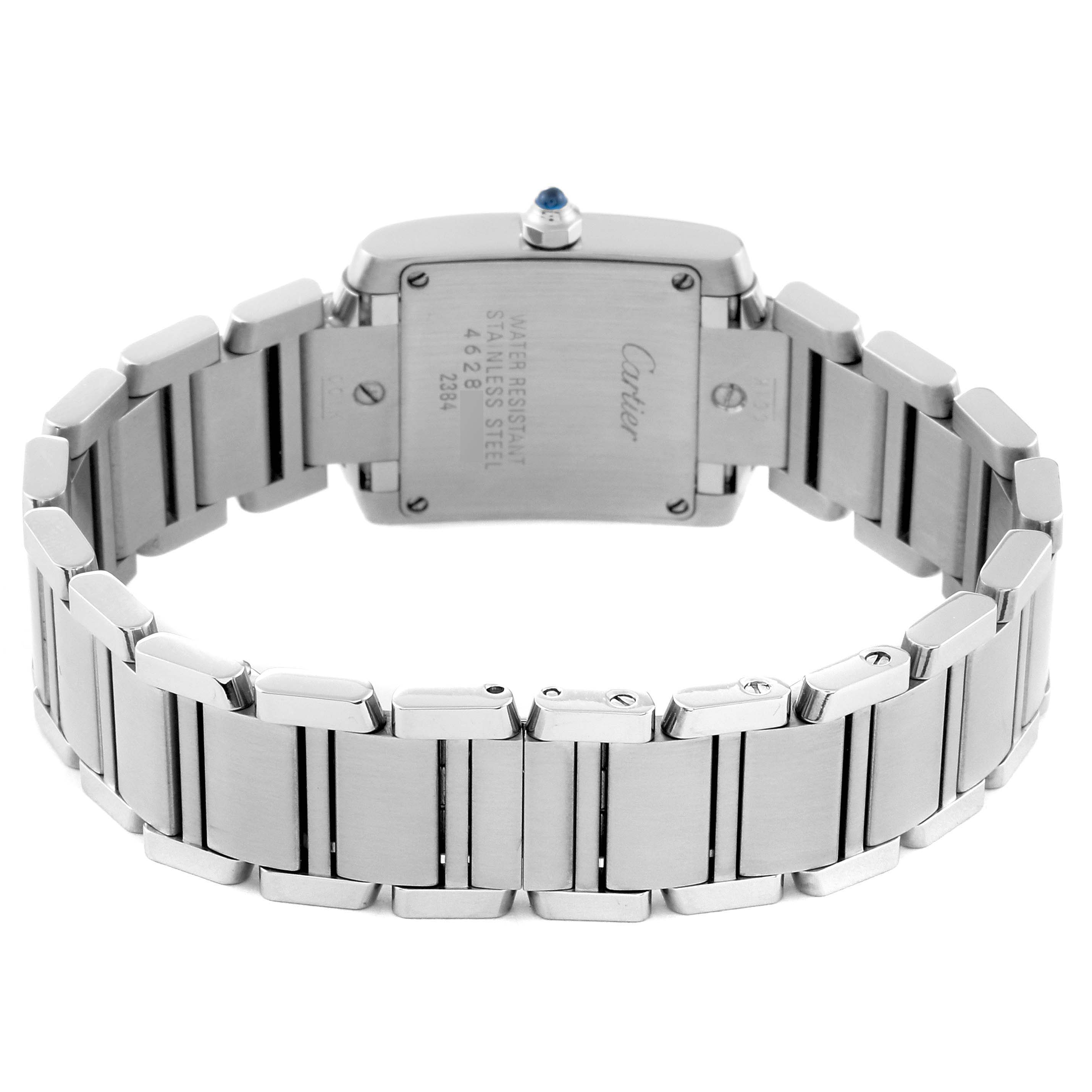 The image shows the back of a Cartier Tank Française watch, focusing on the stainless steel case and bracelet.