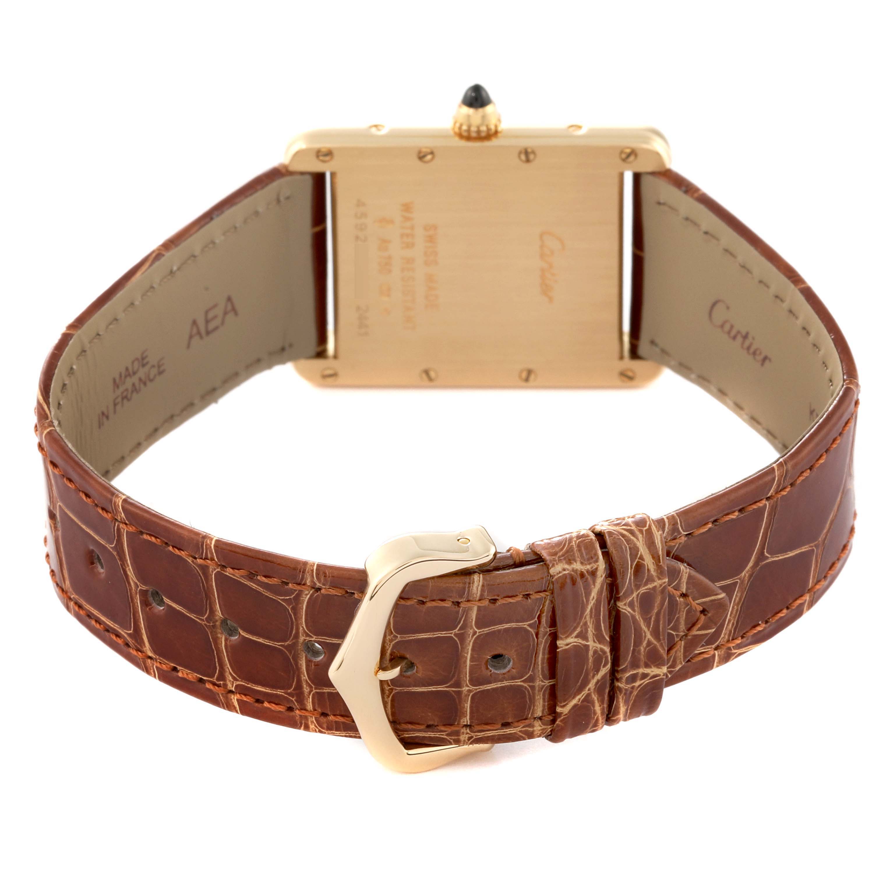 This image shows the back view of the Cartier Tank Louis W1529756 Men
s Yellow Gold Silver Dial W1529756 Men
s Yellow Gold Silver Dial watch, featuring the back case, crown, and brown leather strap with buckle.