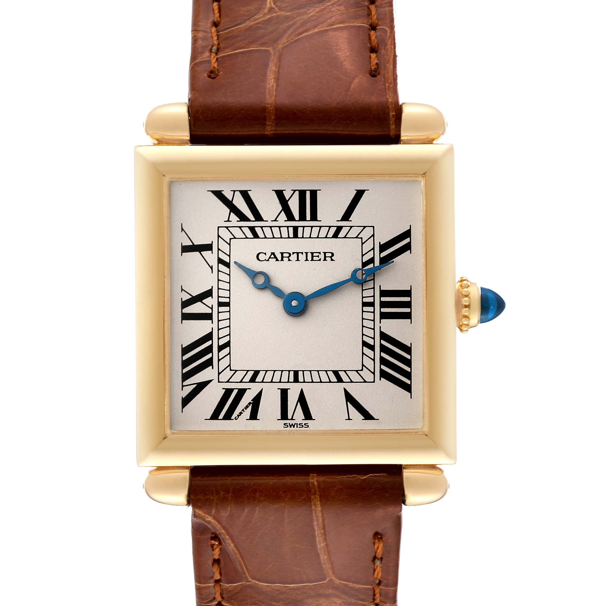 The image shows a Cartier Tank Obus W1512256 Women's Yellow Gold Silver Dial W1512256 Women's Yellow Gold Silver Dial watch from a front angle, highlighting the dial, Roman numerals, hands, and brown leather strap.