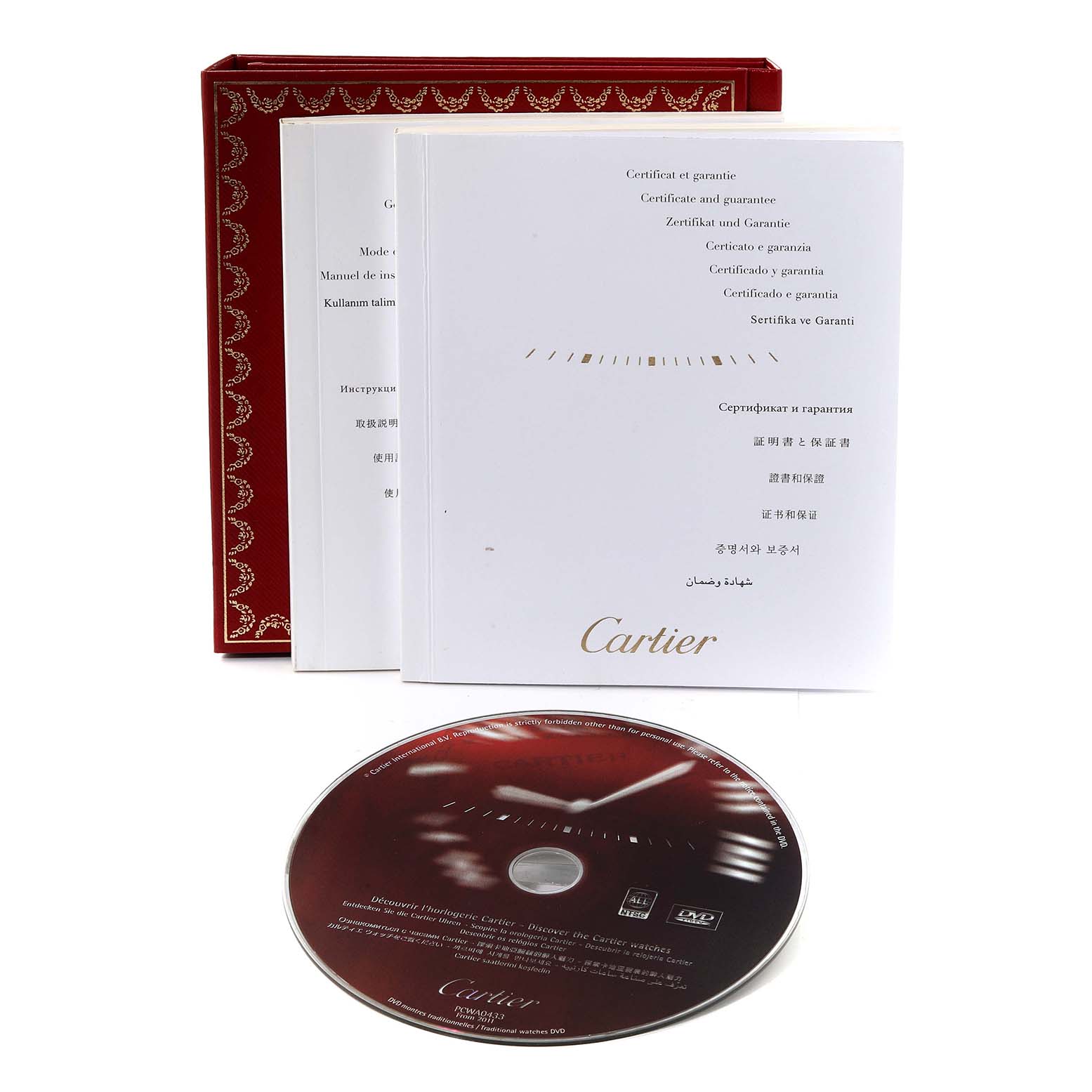 The image shows booklets and a DVD for the Cartier Tank Solo W5200002 Women
s Steel and Gold (two tone) Silver Dial W5200002 Women
s Steel and Gold (two tone) Silver Dial model, along with a red box in the background.