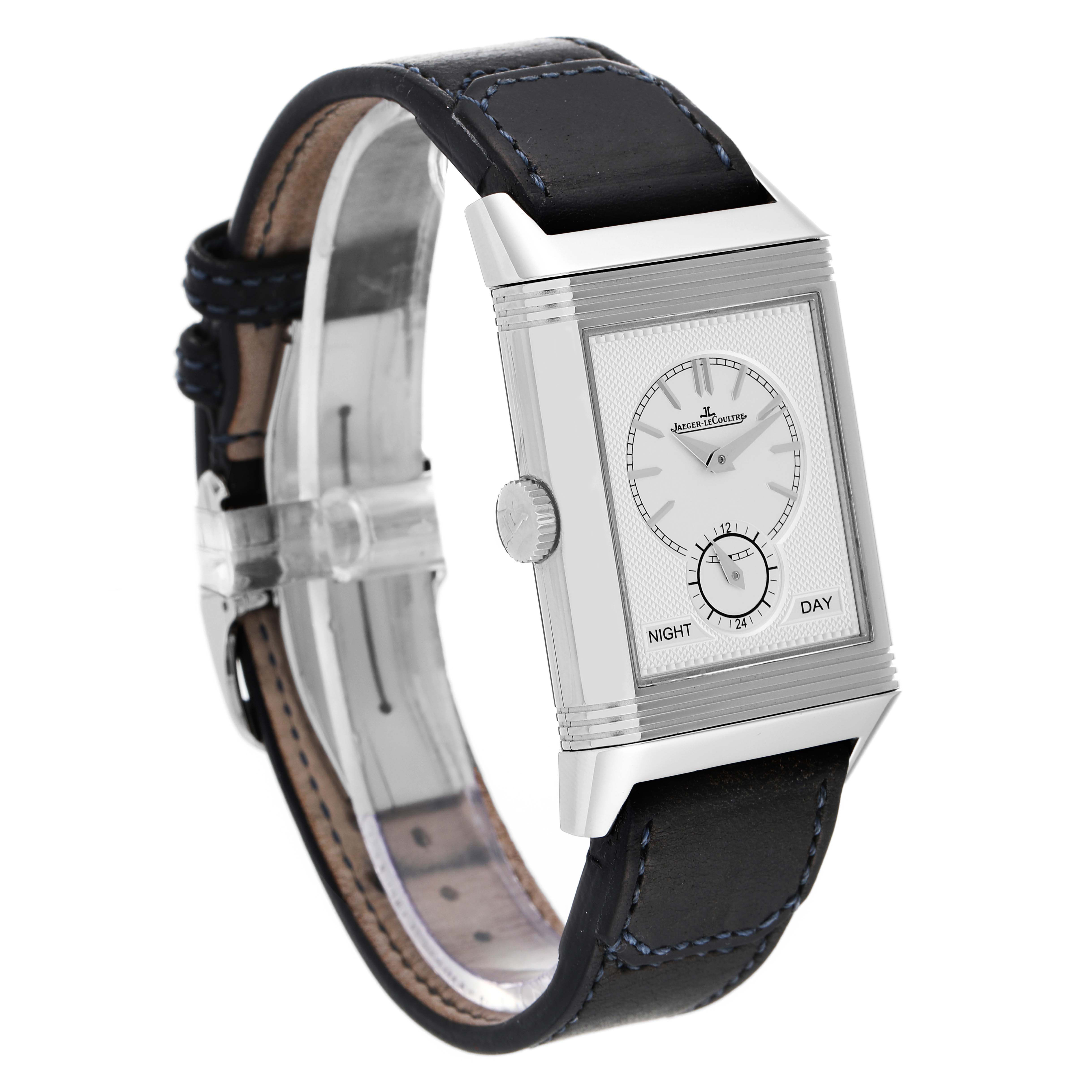 This Jaeger LeCoultre Reverso Q3988482 Men's Stainless Steel Blue Dial Q3988482 Men's Stainless Steel Blue Dial model watch is shown at an angle highlighting the rectangular face, dual dials, and black leather strap.