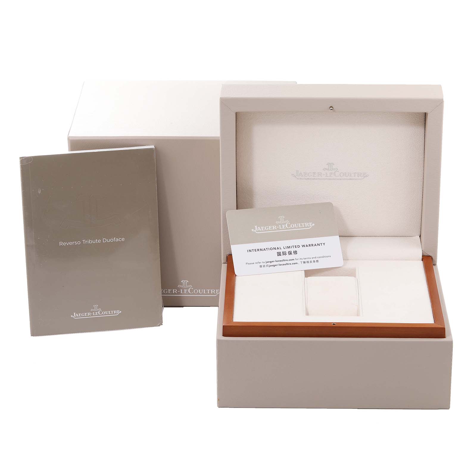 The image shows the original packaging, warranty card, and manual for the Jaeger LeCoultre Reverso Q3988482 Men's Stainless Steel Blue Dial Q3988482 Men's Stainless Steel Blue Dial Tribute Duoface.