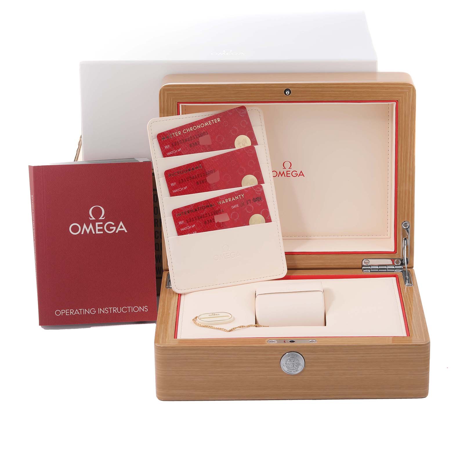 The image shows the packaging and accessories for the Omega Constellation 131.23.41.21.11.001 Men
s Steel and Gold (two tone) Red Dial 131.23.41.21.11.001 Men
s Steel and Gold (two tone) Red Dial watch, including a leather pouch, warranty cards, and an operating manual.