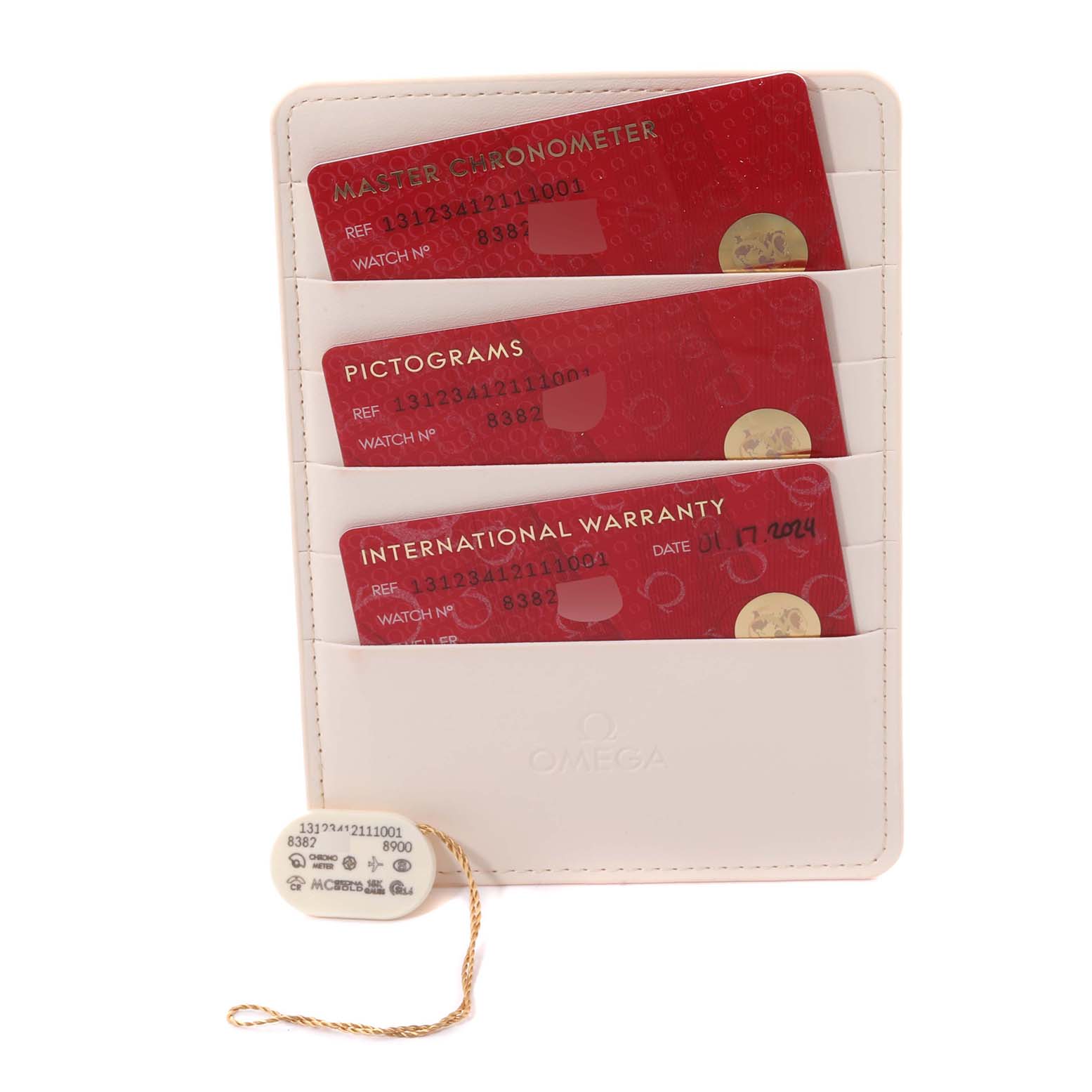 The image shows an Omega Constellation 131.23.41.21.11.001 Men
s Steel and Gold (two tone) Red Dial 131.23.41.21.11.001 Men
s Steel and Gold (two tone) Red Dial watch
s certification cards and hang tag, angled straight on for clear visibility.