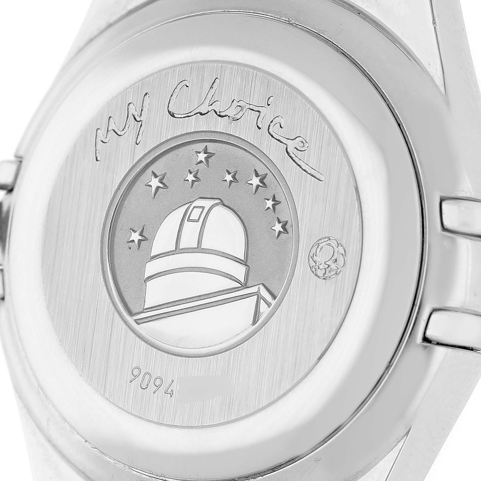 The image shows the back case of the Omega 1495.79.00 Women's Stainless Steel Mother of Pearl Dial Constellation Steel Multi Stone MOP Diamond Watch 1495.79.00, featuring engraved details.