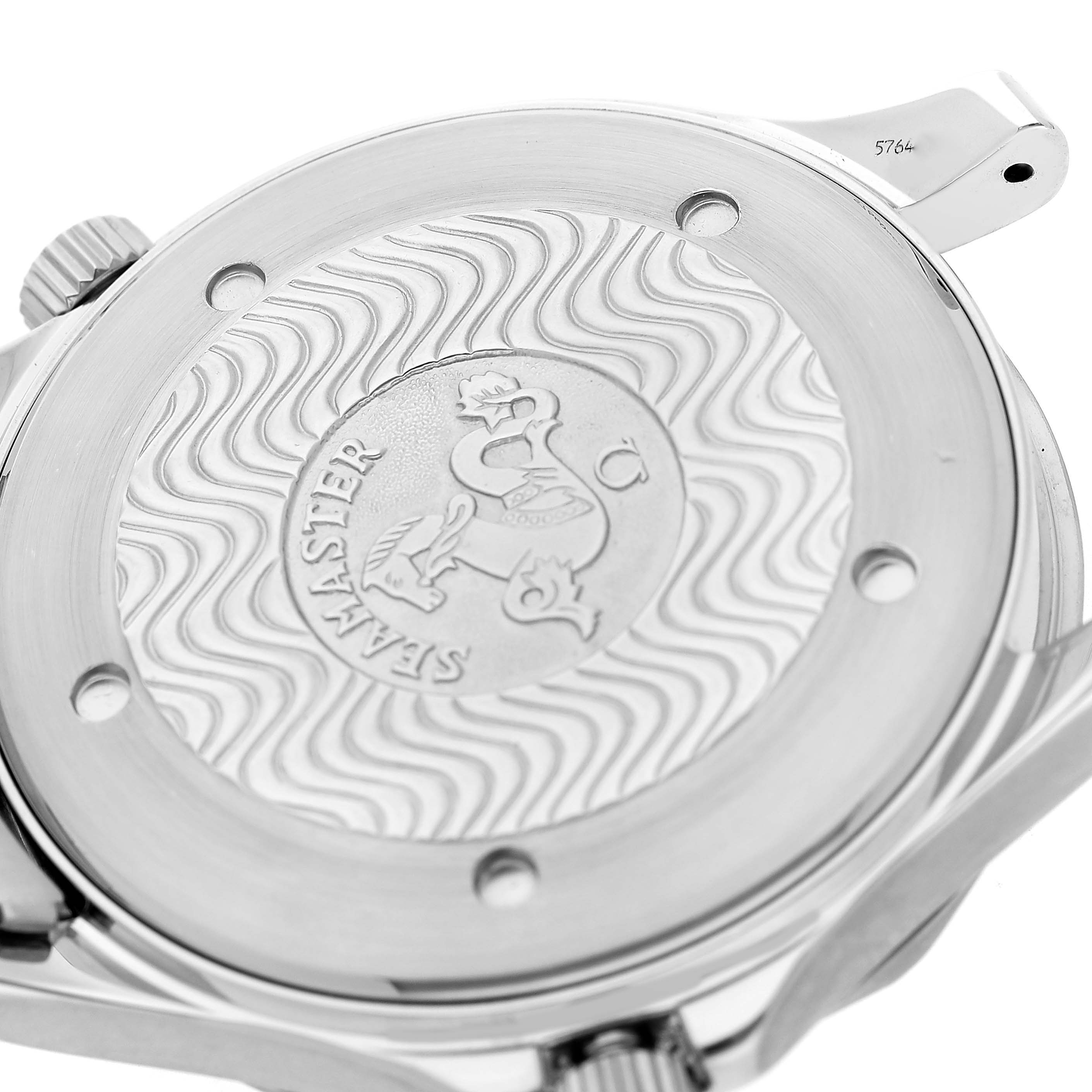 The image shows the back case of an Omega Seamaster 2541.80.00 Men's Stainless Steel Blue Dial watch, highlighting the embossed logo and wave pattern.