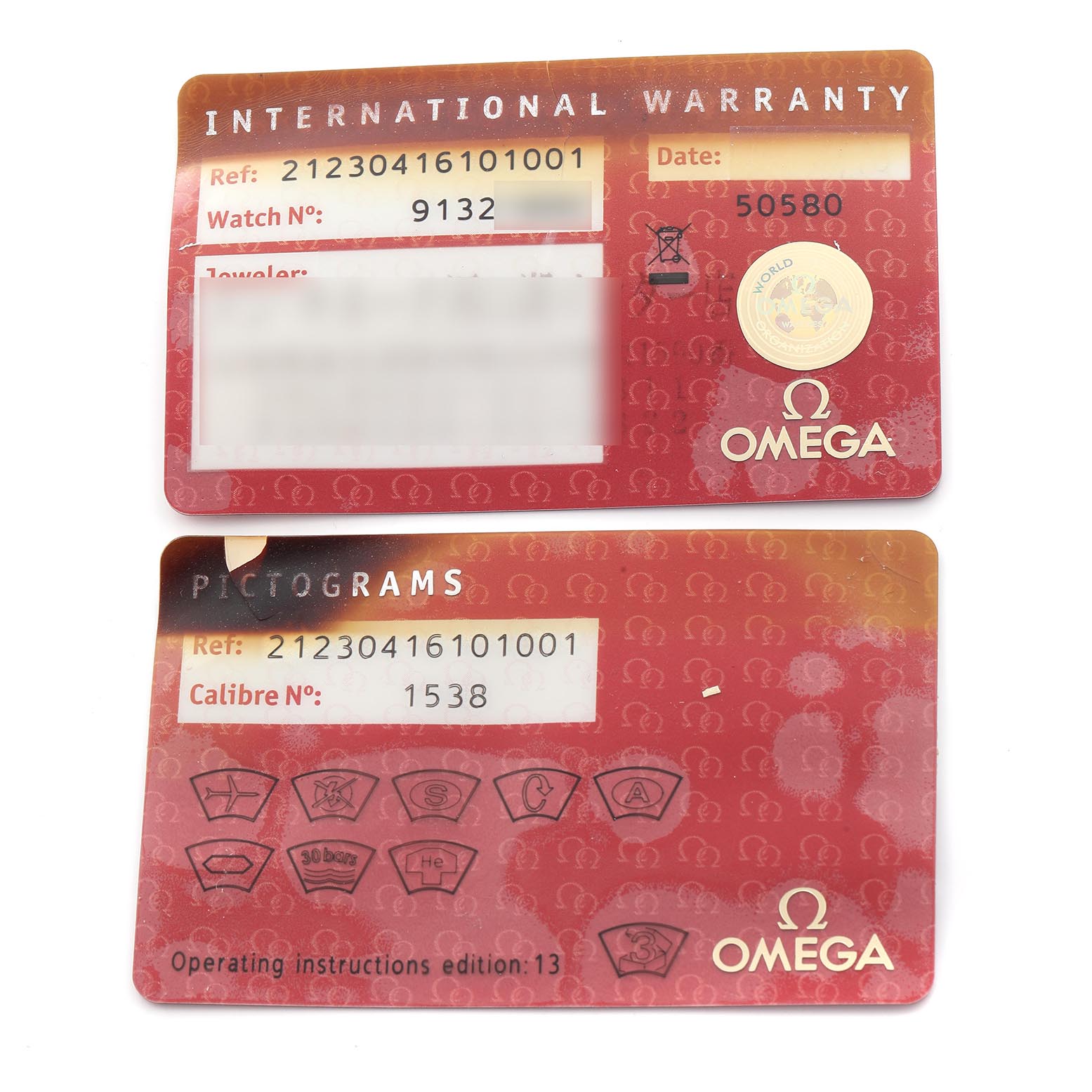 The image shows two Omega Seamaster 212.30.41.61.01.001 Men's Stainless Steel Black Dial 212.30.41.61.01.001 Men's Stainless Steel Black Dial cards: an International Warranty card and a Pictograms card, both viewed from above.