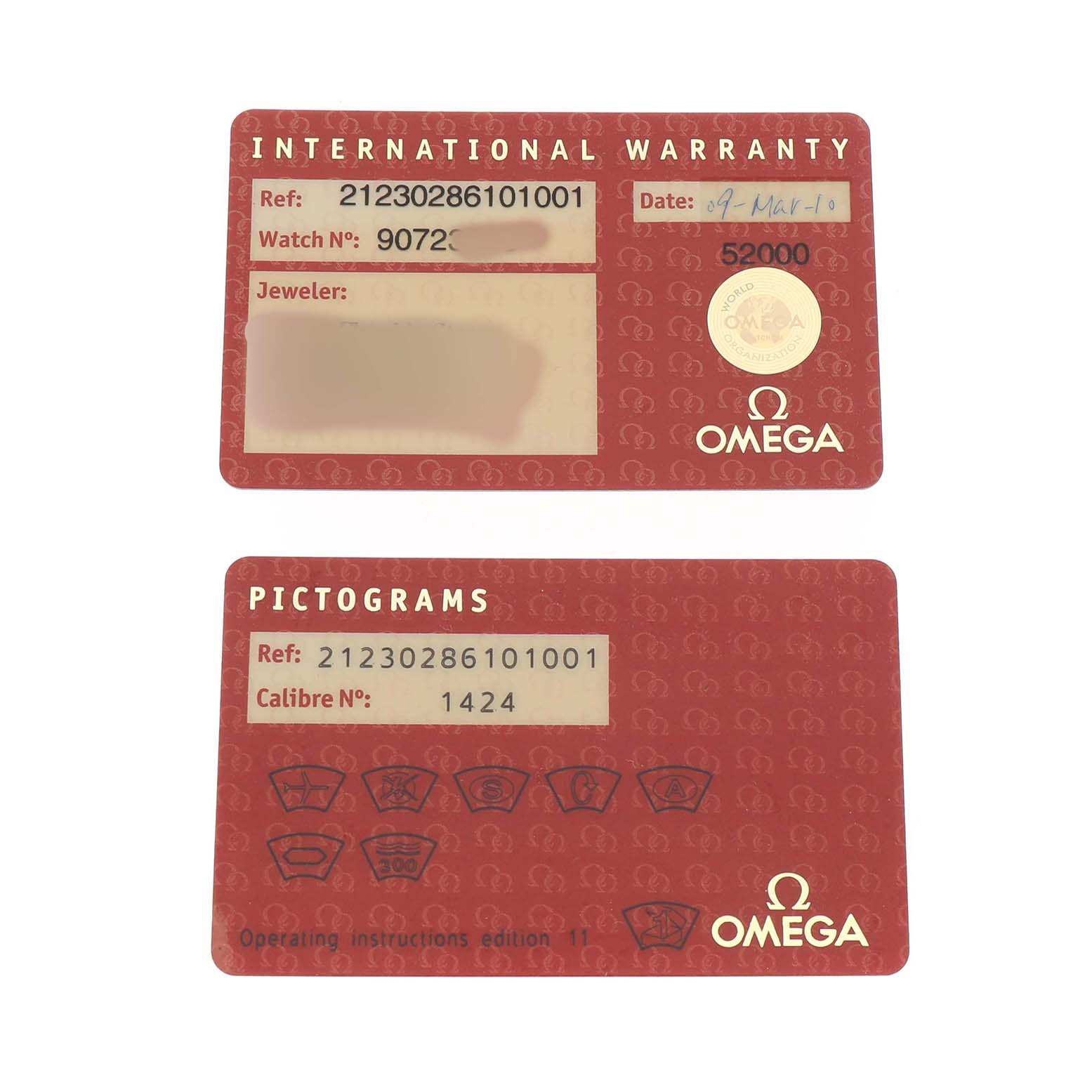 This image shows two red Omega 212.30.28.61.01.001 Women's Stainless Steel Black Dial cards for the Seamaster Diver 300M Steel Ladies Watch, including an international warranty and pictograms card.