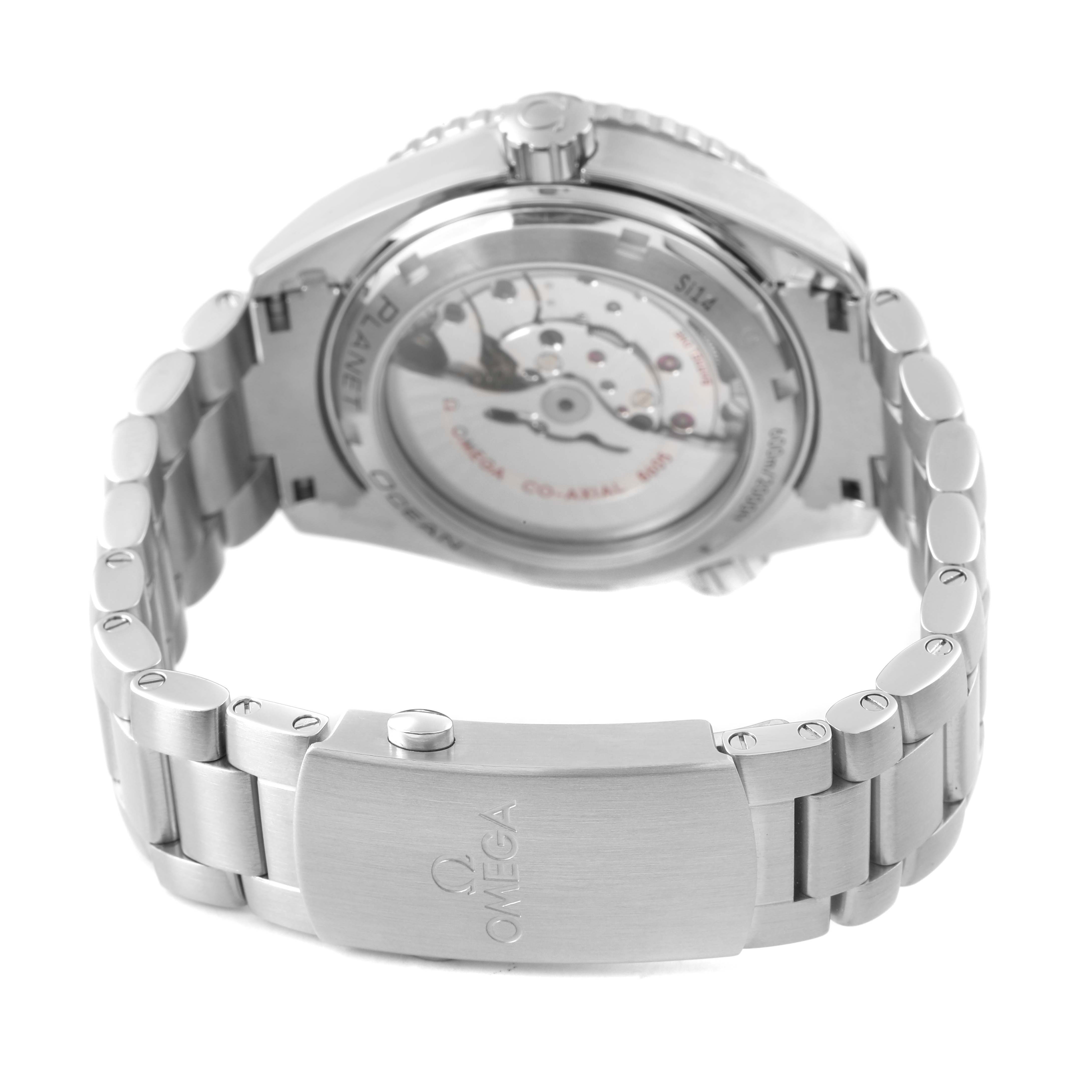 The image shows the back view of the Omega Planet Ocean 232.30.44.22.01.001 Men's Stainless Steel Black Dial watch, highlighting the stainless steel bracelet and transparent case back.